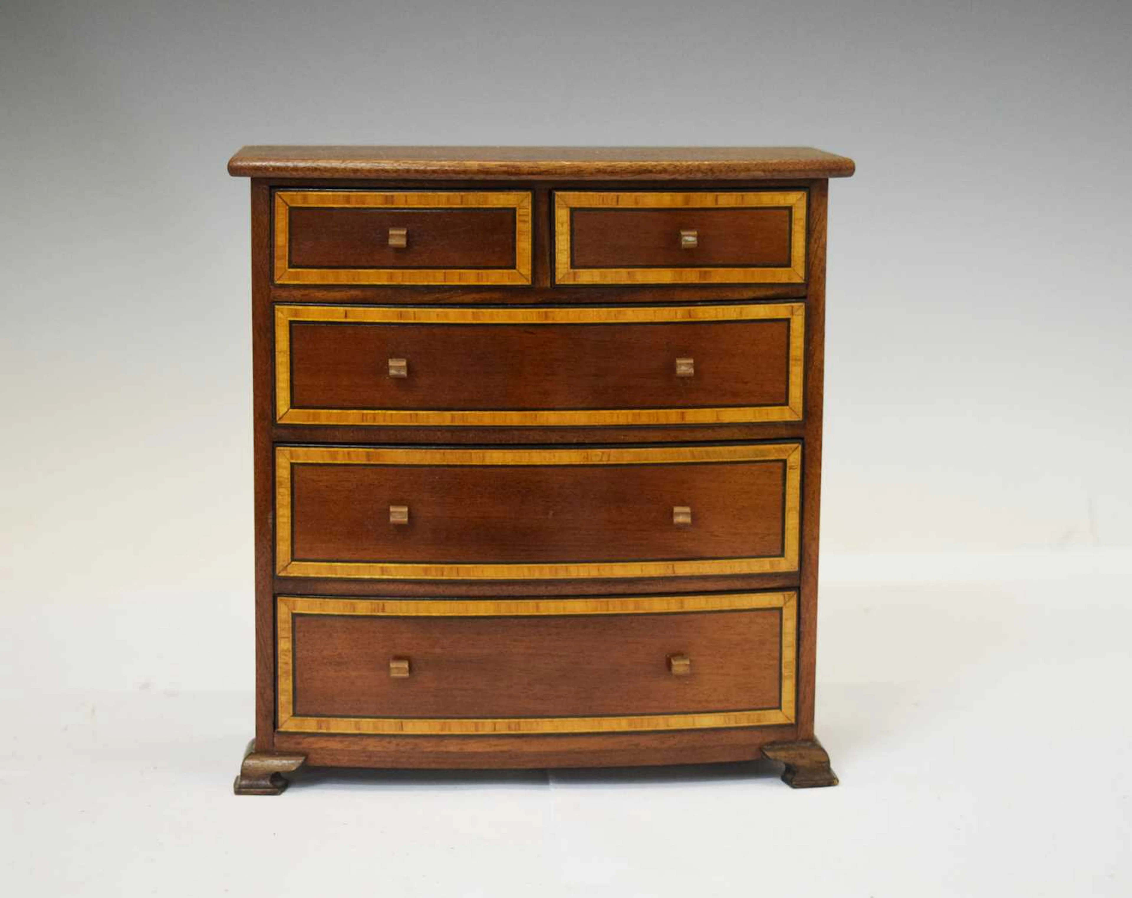 Early 20th century 'apprentice piece' miniature bowfront chest of drawers