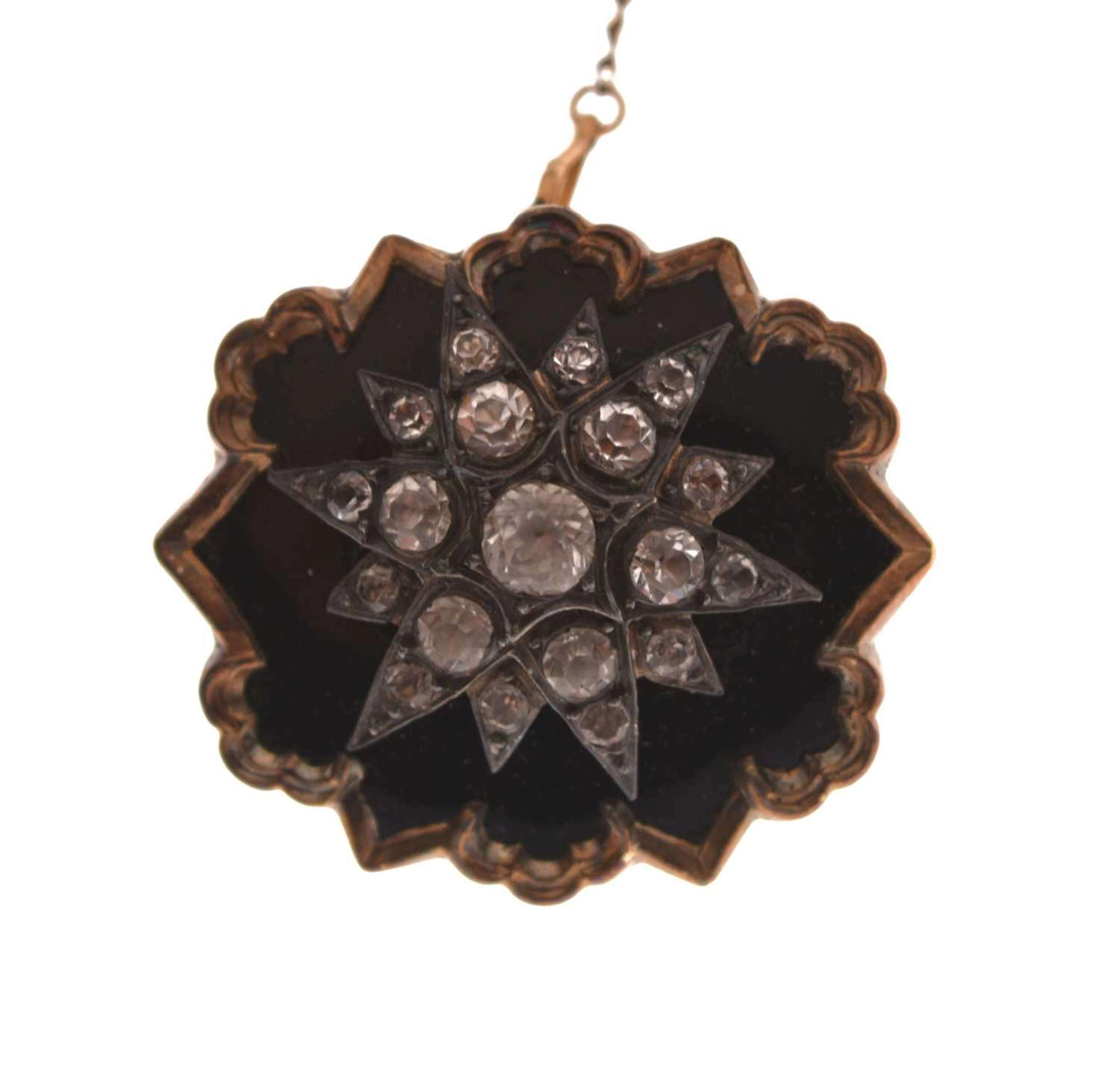 19th century paste and black enamel brooch