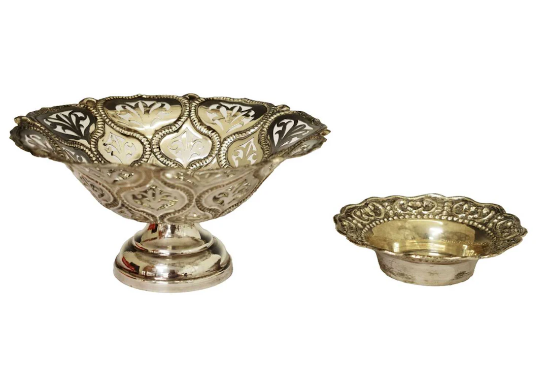 20th century white-metal pedestal bowl together with a white metal dish