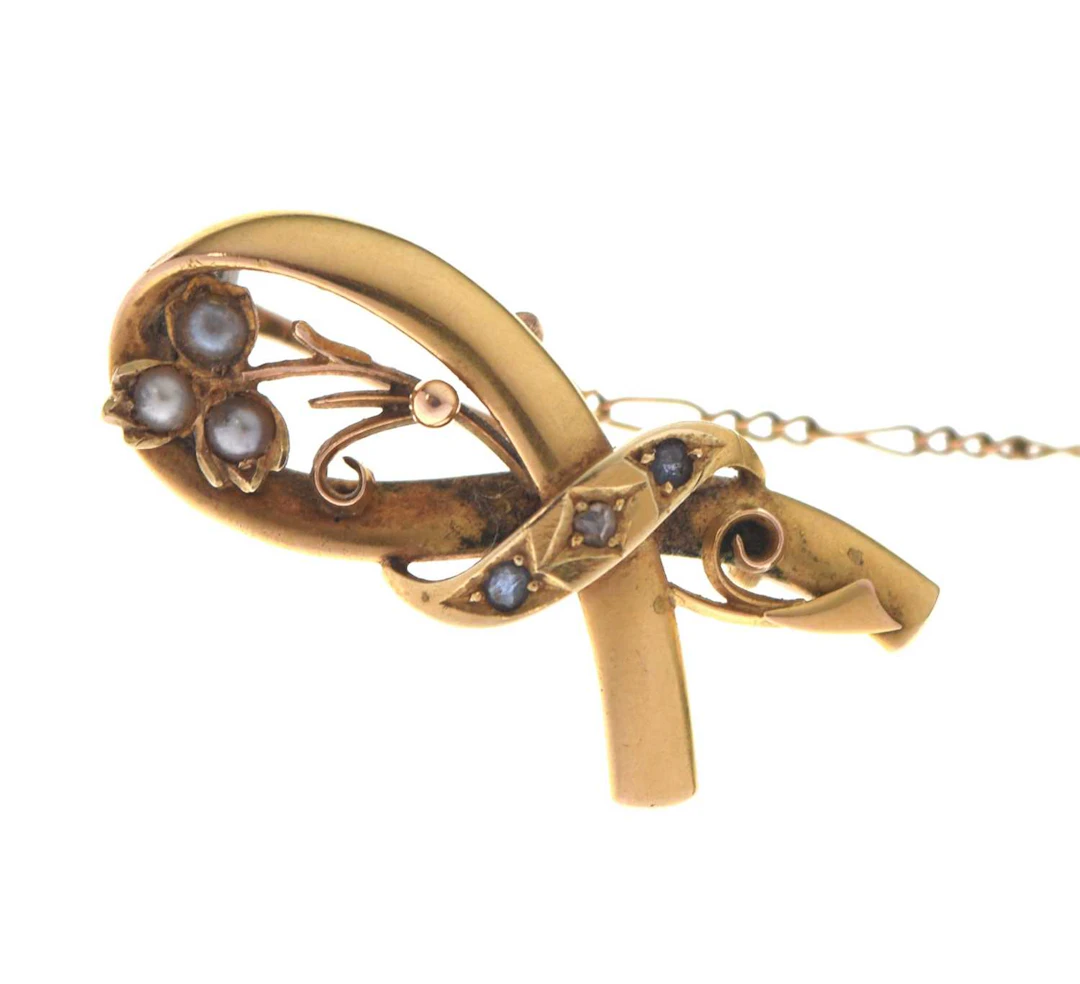 Late Victorian / Edwardian diamond, sapphire and seed pearl yellow metal brooch