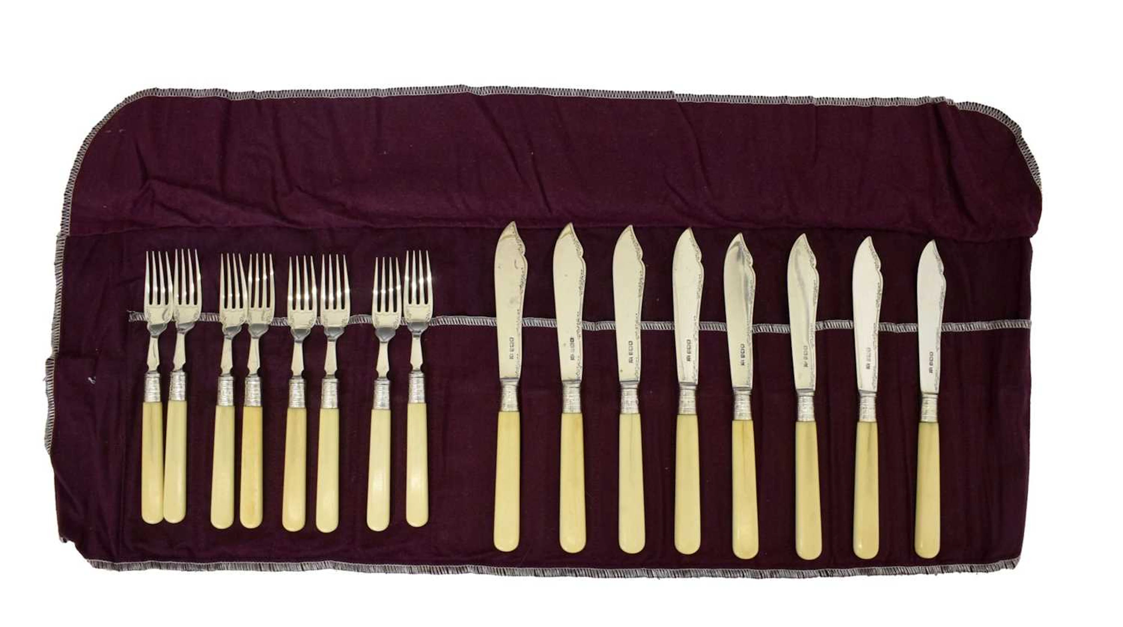 Set of eight George V silver-bladed fish knives and forks