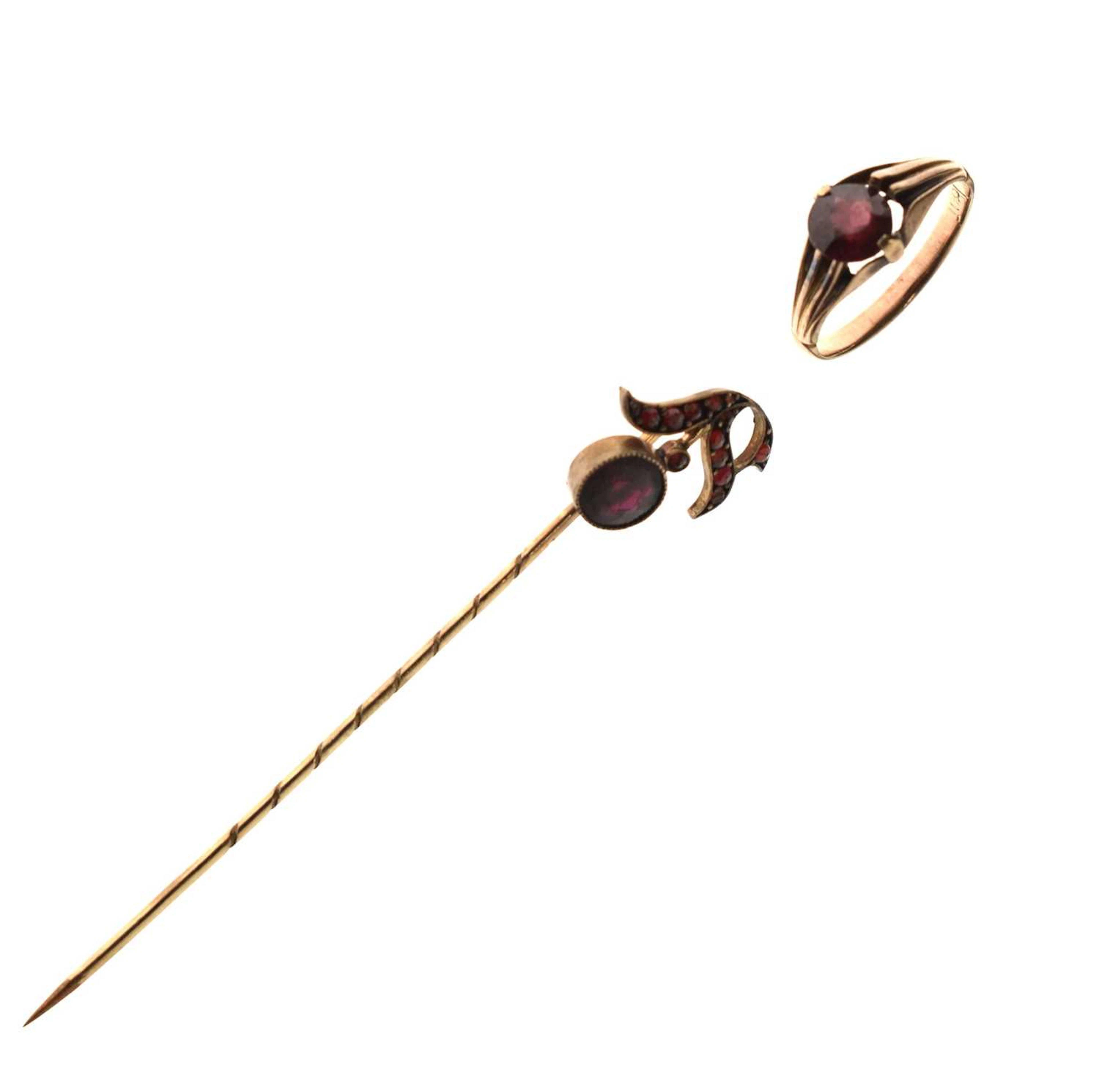 Early 20th century garnet dress ring, plus a stick pin (2)