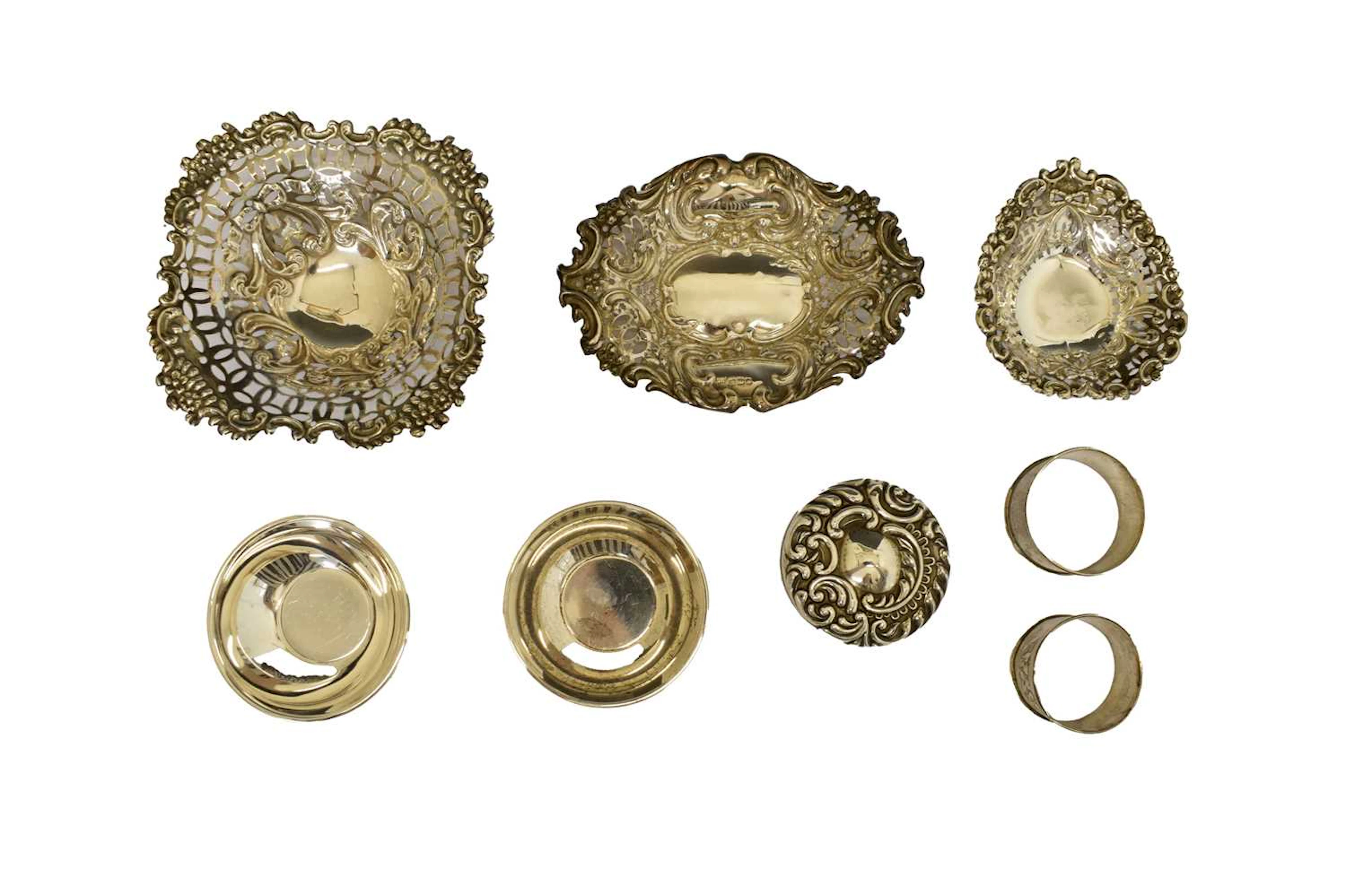 Collection of silver to include three silver bon bon dishes, napkin rings, etc