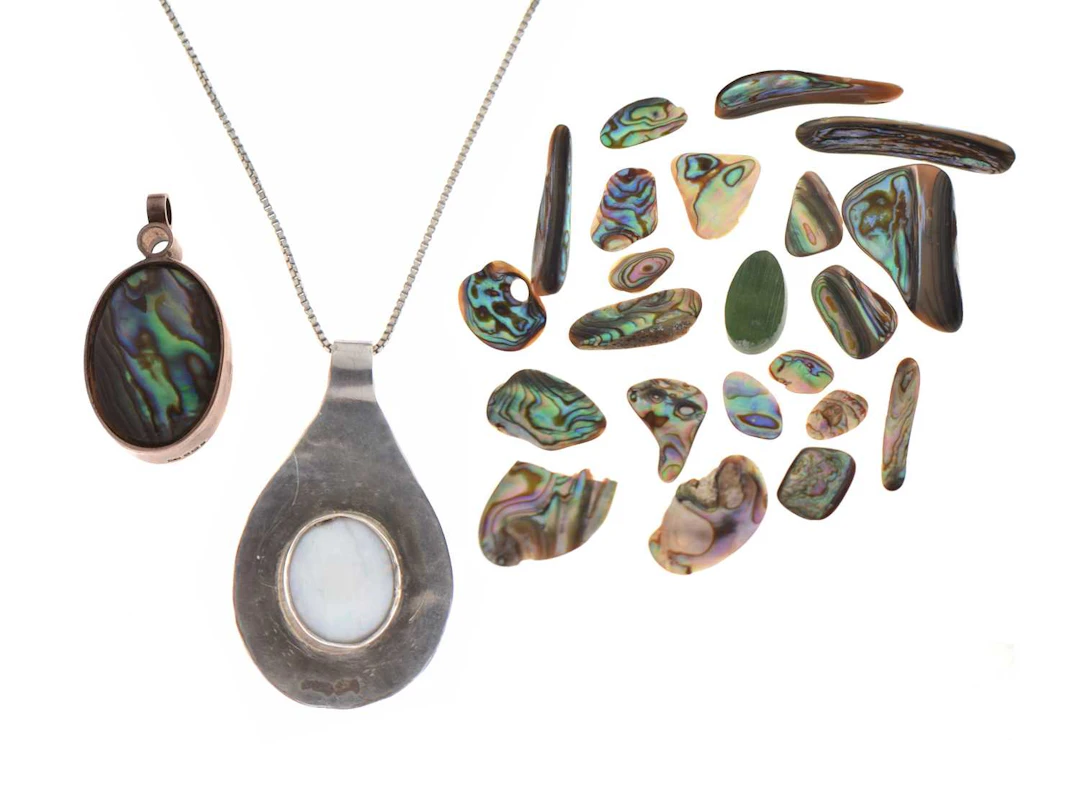 Opal silver pendant necklace together with an abalone shell and mother-of-pearl
