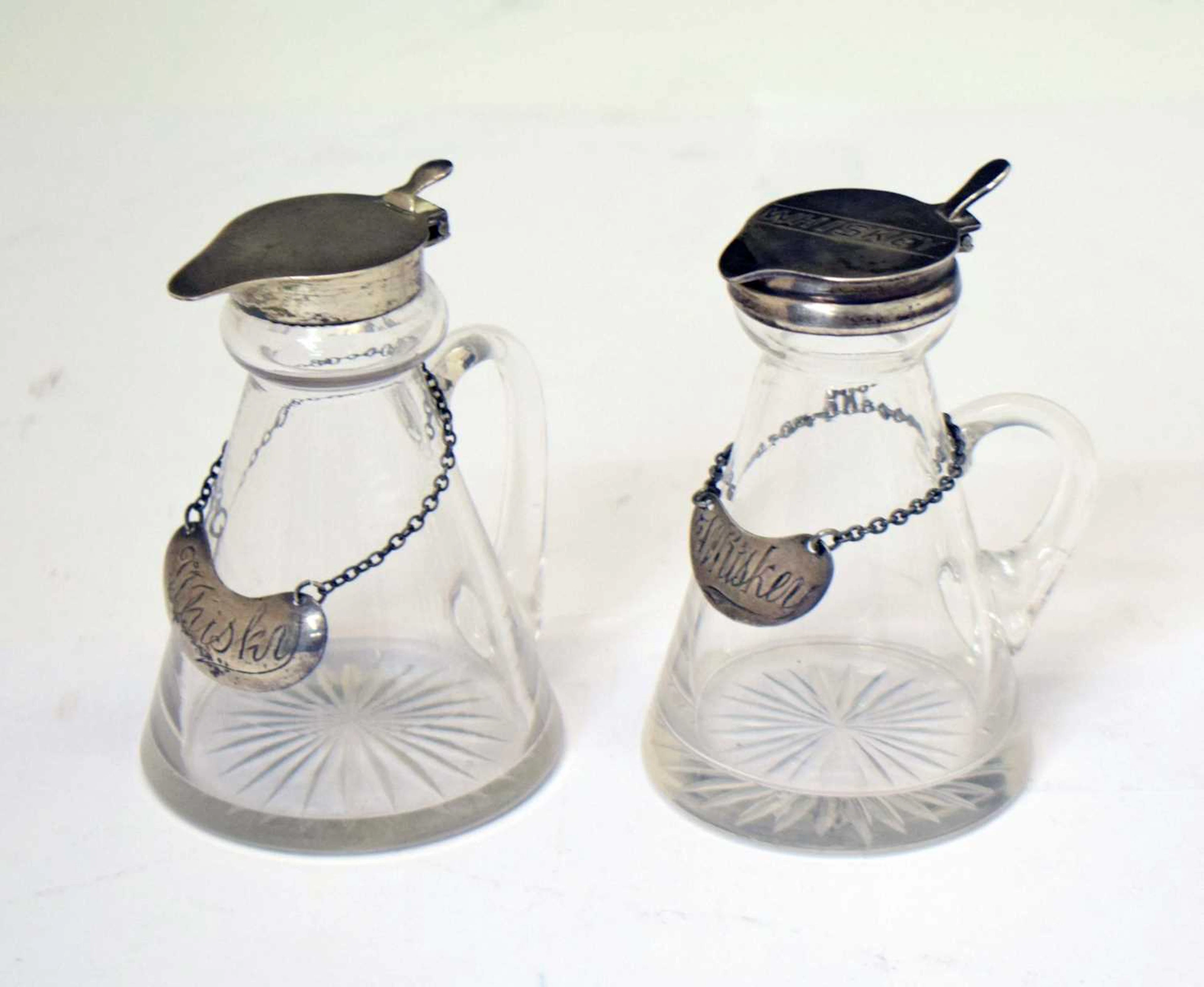 Two silver mounted cut glass whisky noggins