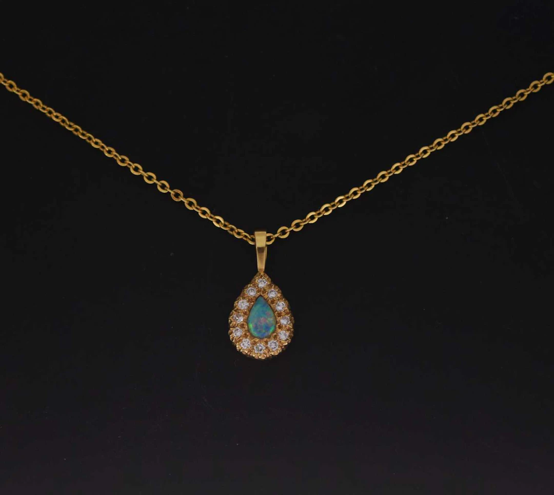 Opal and diamond pear-shaped 18ct gold pendant