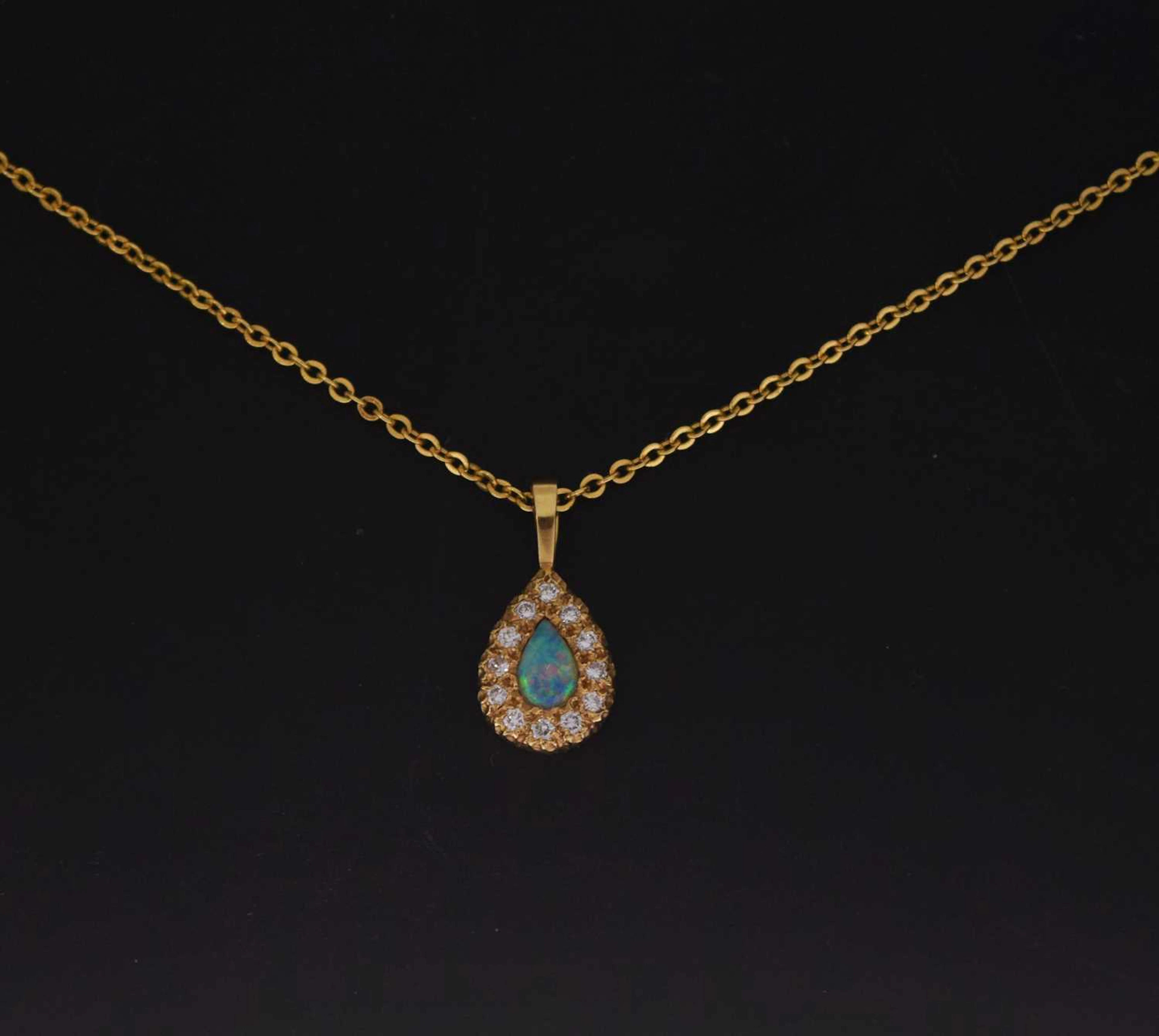 Opal and diamond pear-shaped 18ct gold pendant
