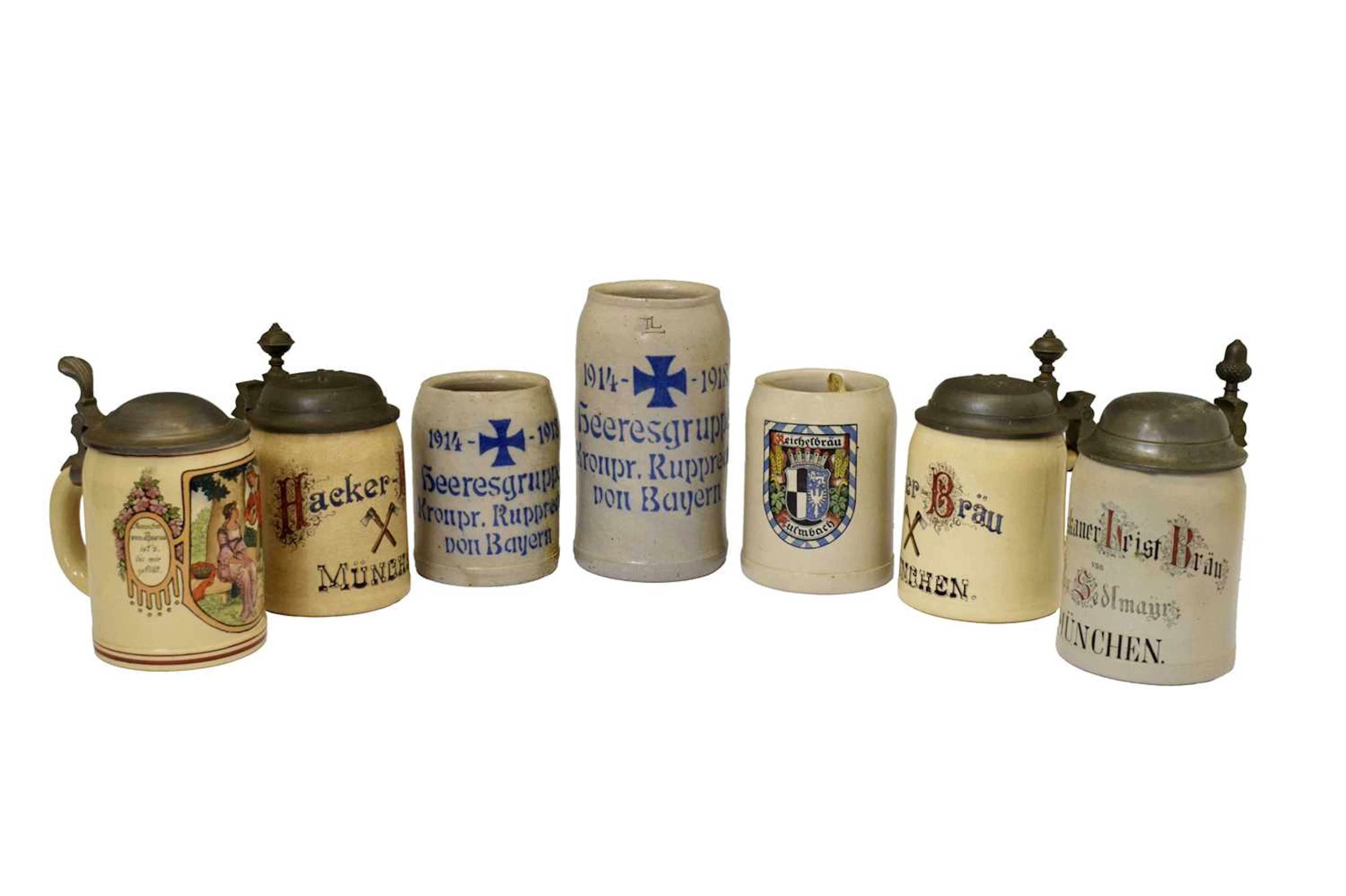 Group of early 20th century German stoneware steins and mugs