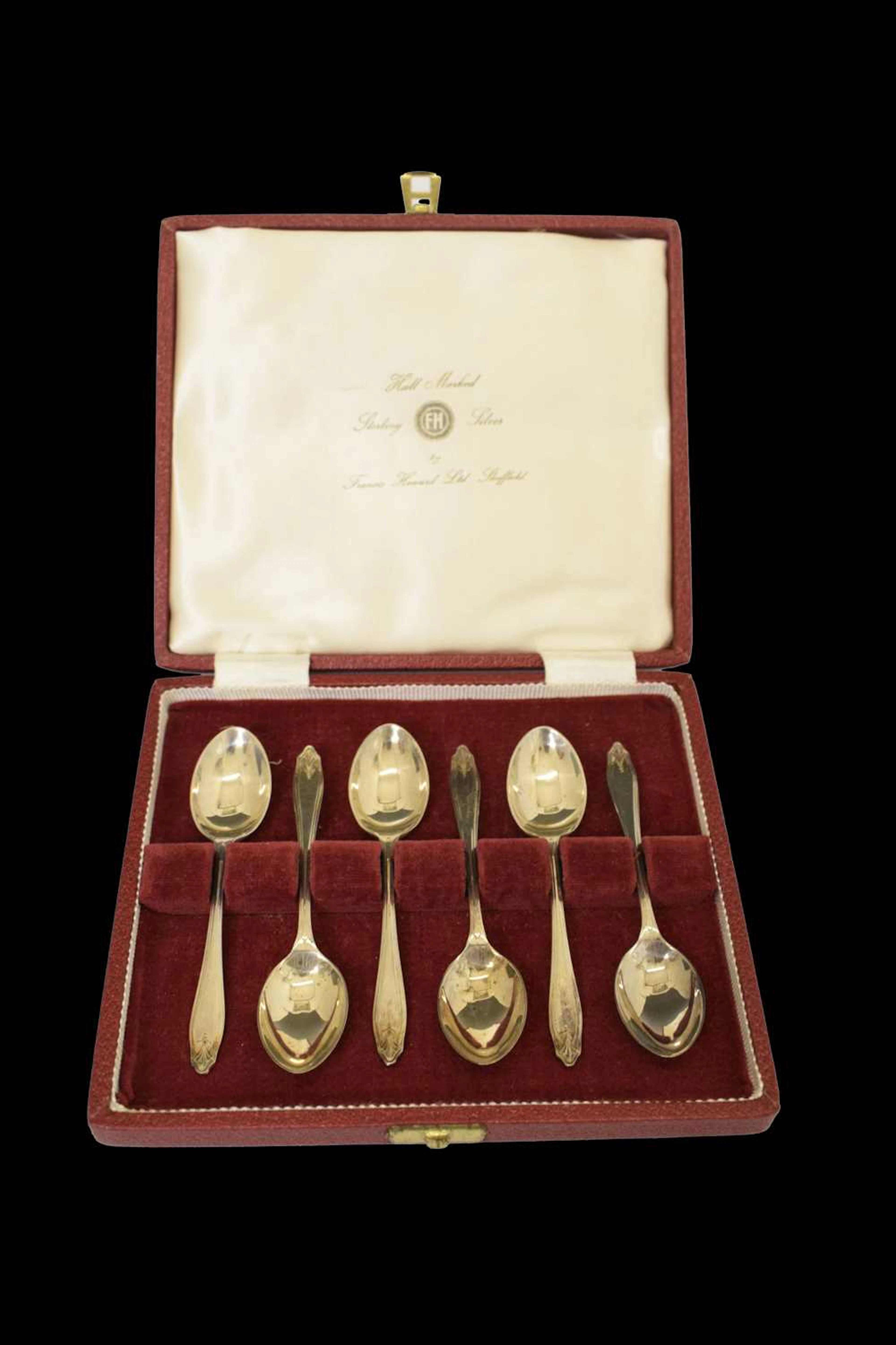 Set of six Elizabeth II silver demi tassee coffee spoons, cased