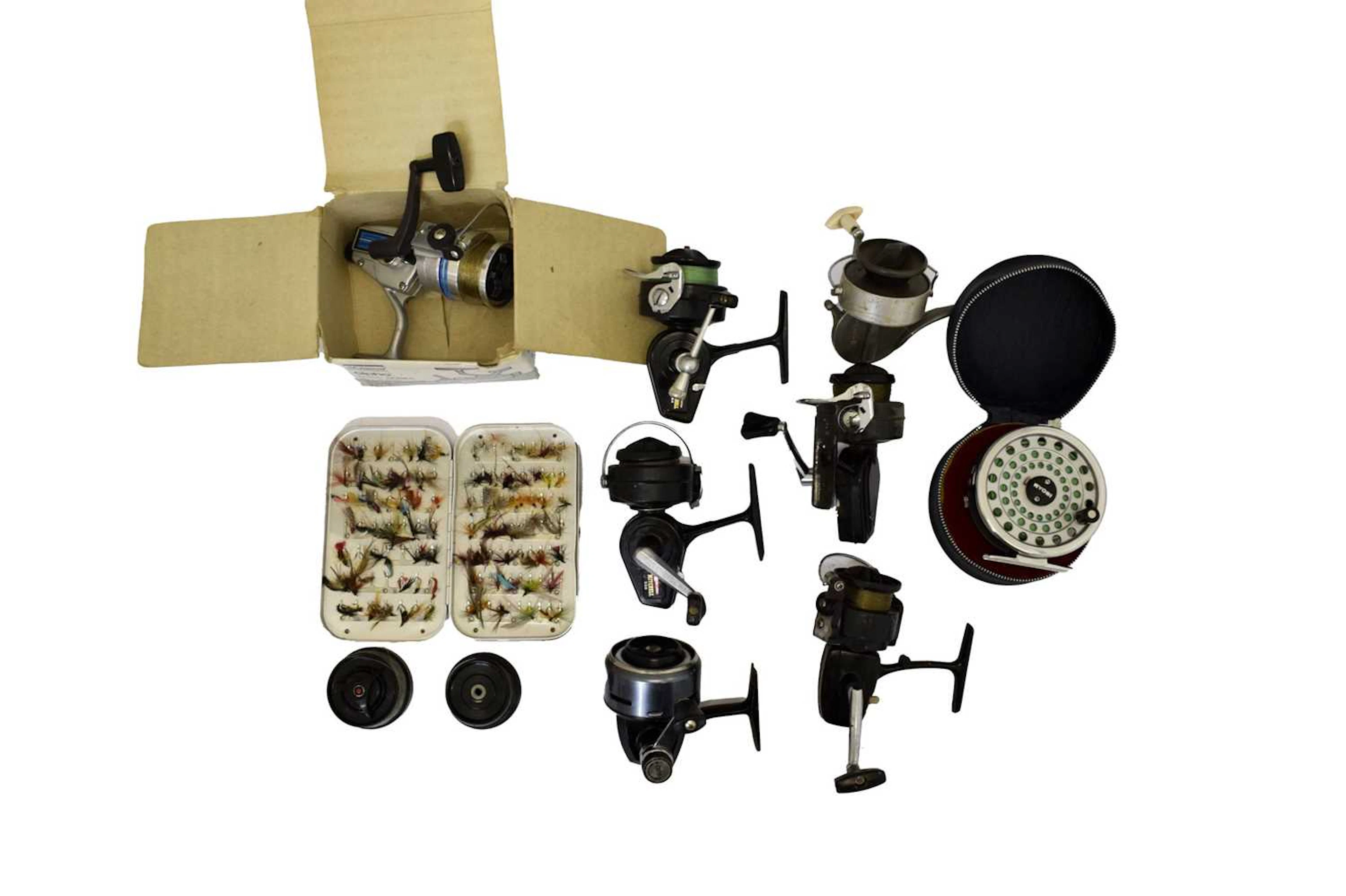 A collection of spinning fishing reels etc
