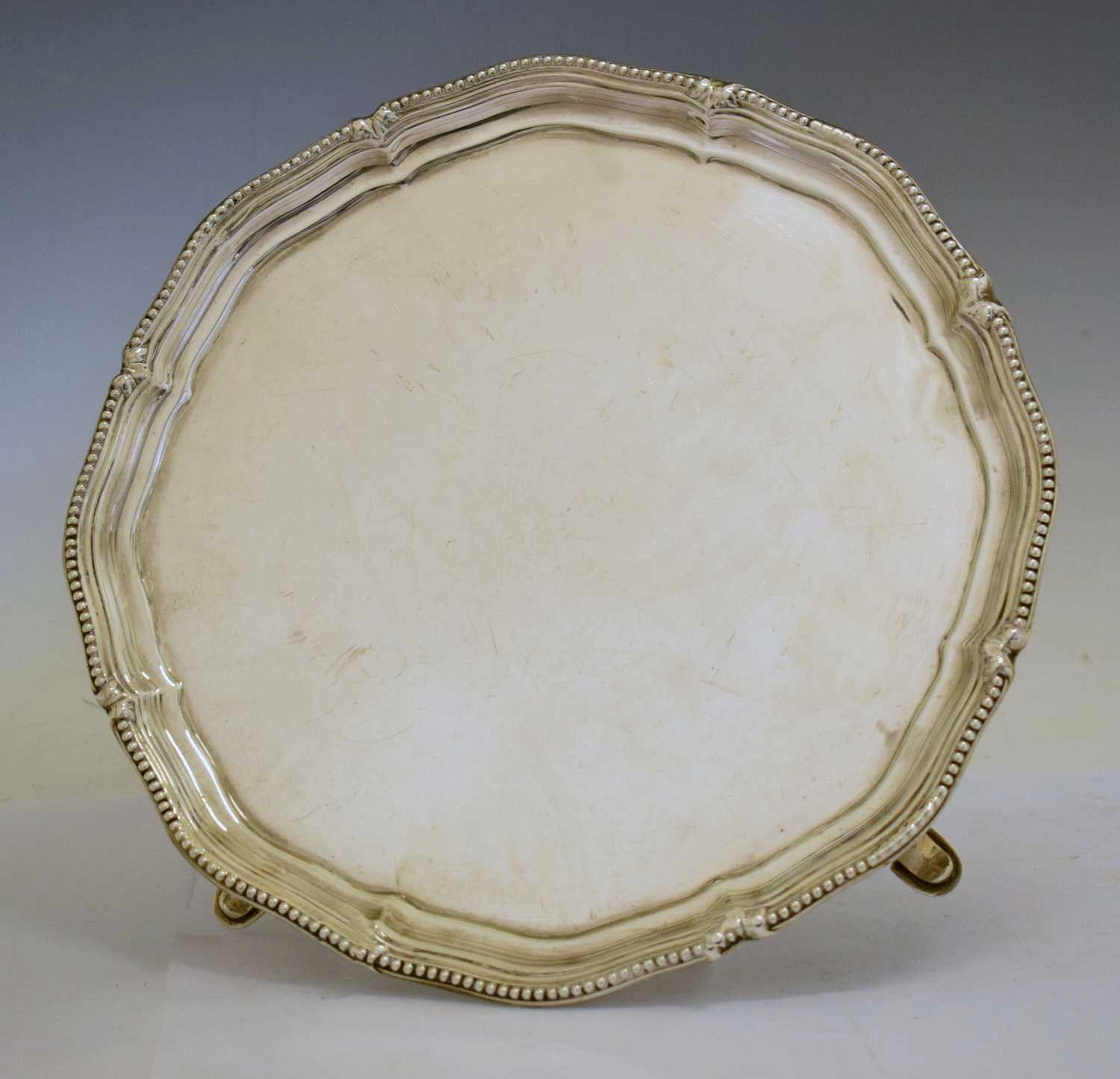 George V silver salver of shaped circular form