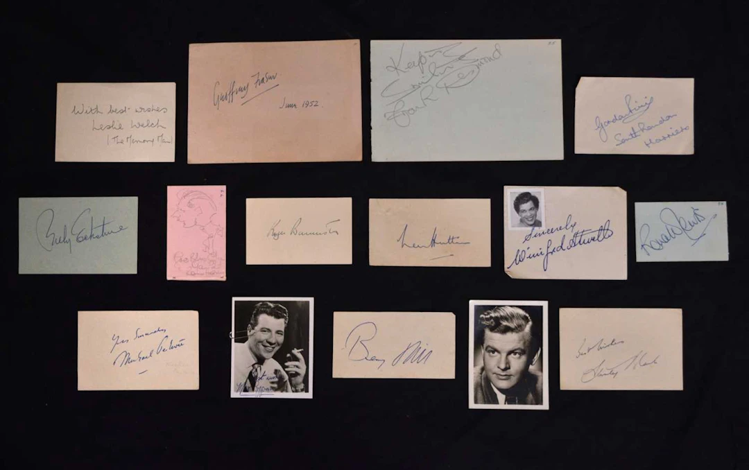 Collection of approximately 60 autographs featuring entertainers