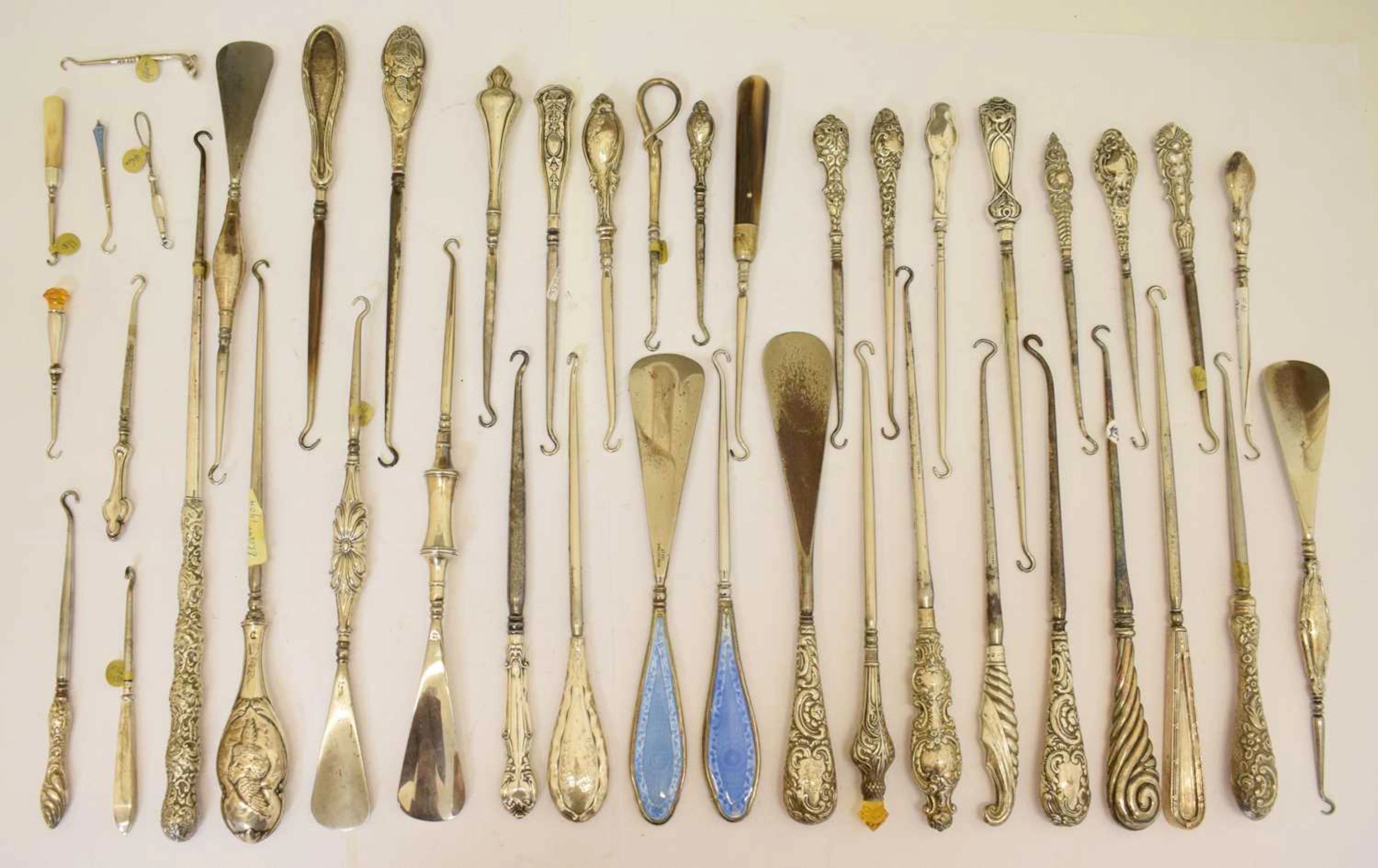 Collection of forty mainly early 20th century silver-handled button