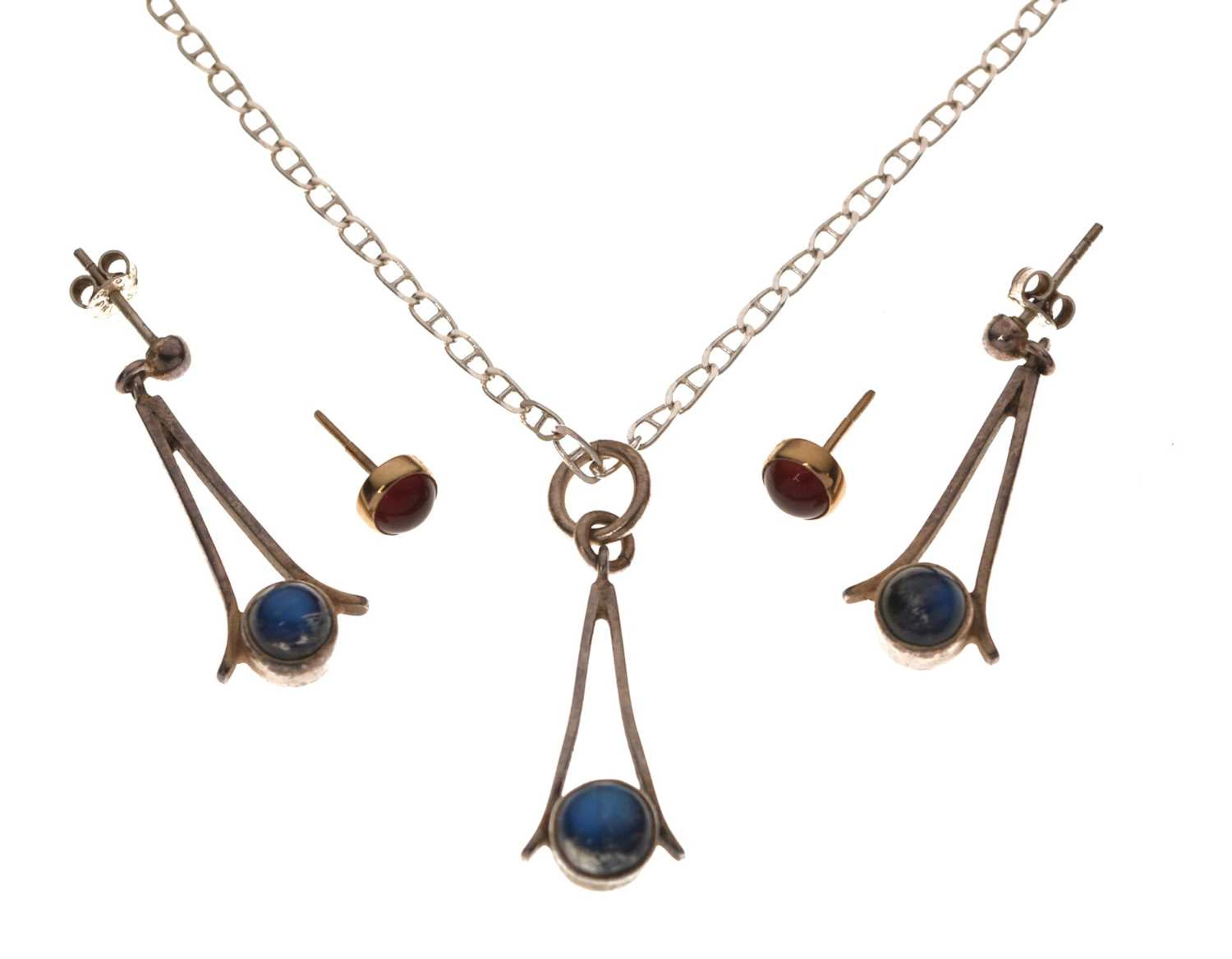 Pair of carnelian yellow metal earrings, and a labradorite silver