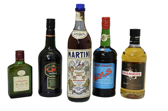 Collection of spirits and mixers to include: Drambuie, etc