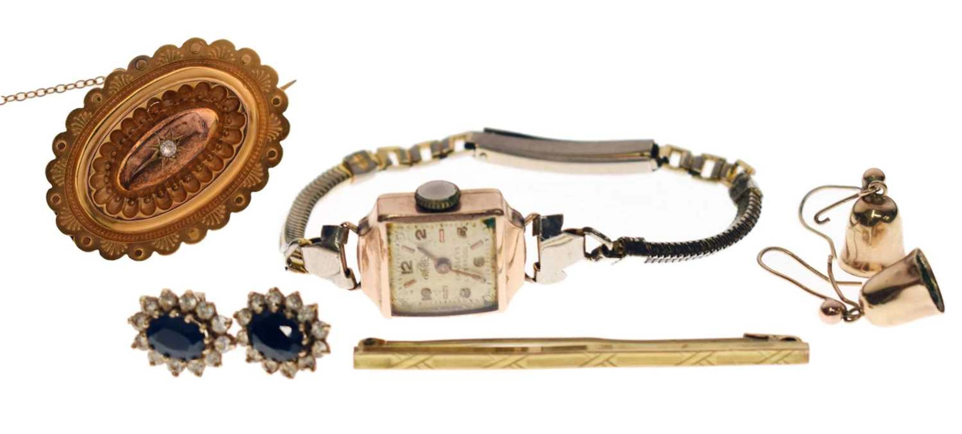 Collection of yellow metal jewellery and a wristwatch