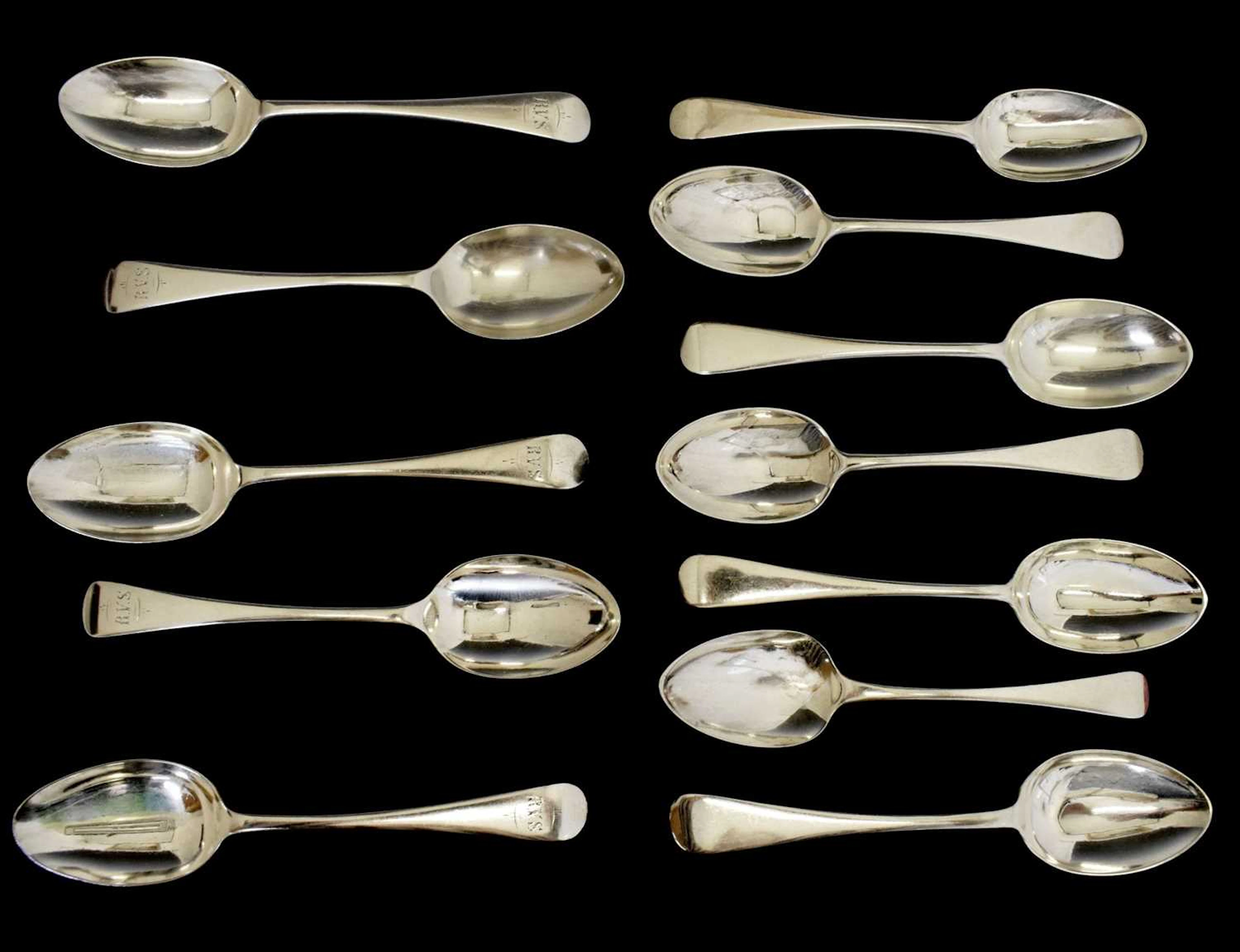 Matched set of twelve silver Old English pattern dessert spoons