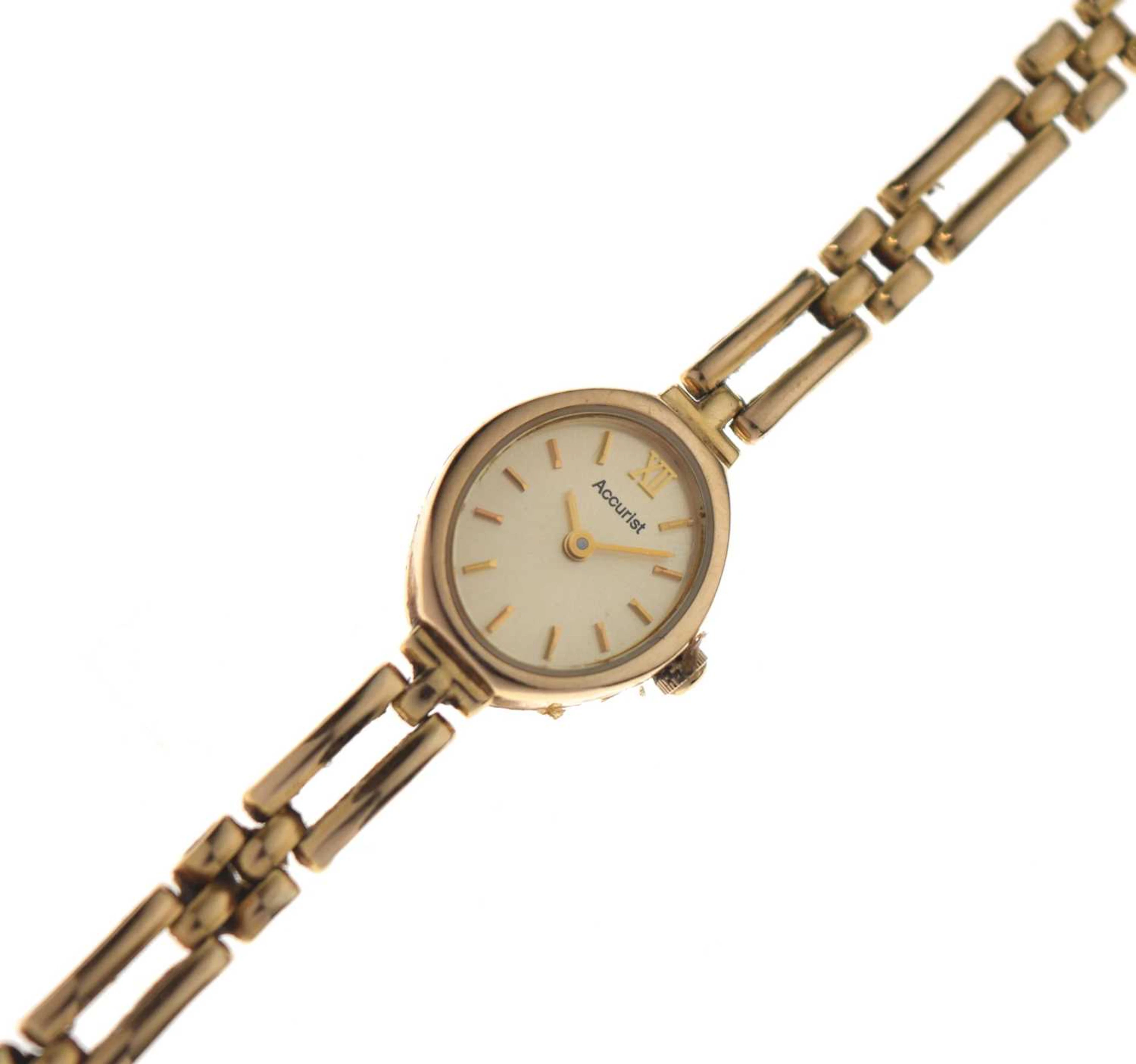 Accurist - Lady's 9ct gold bracelet watch