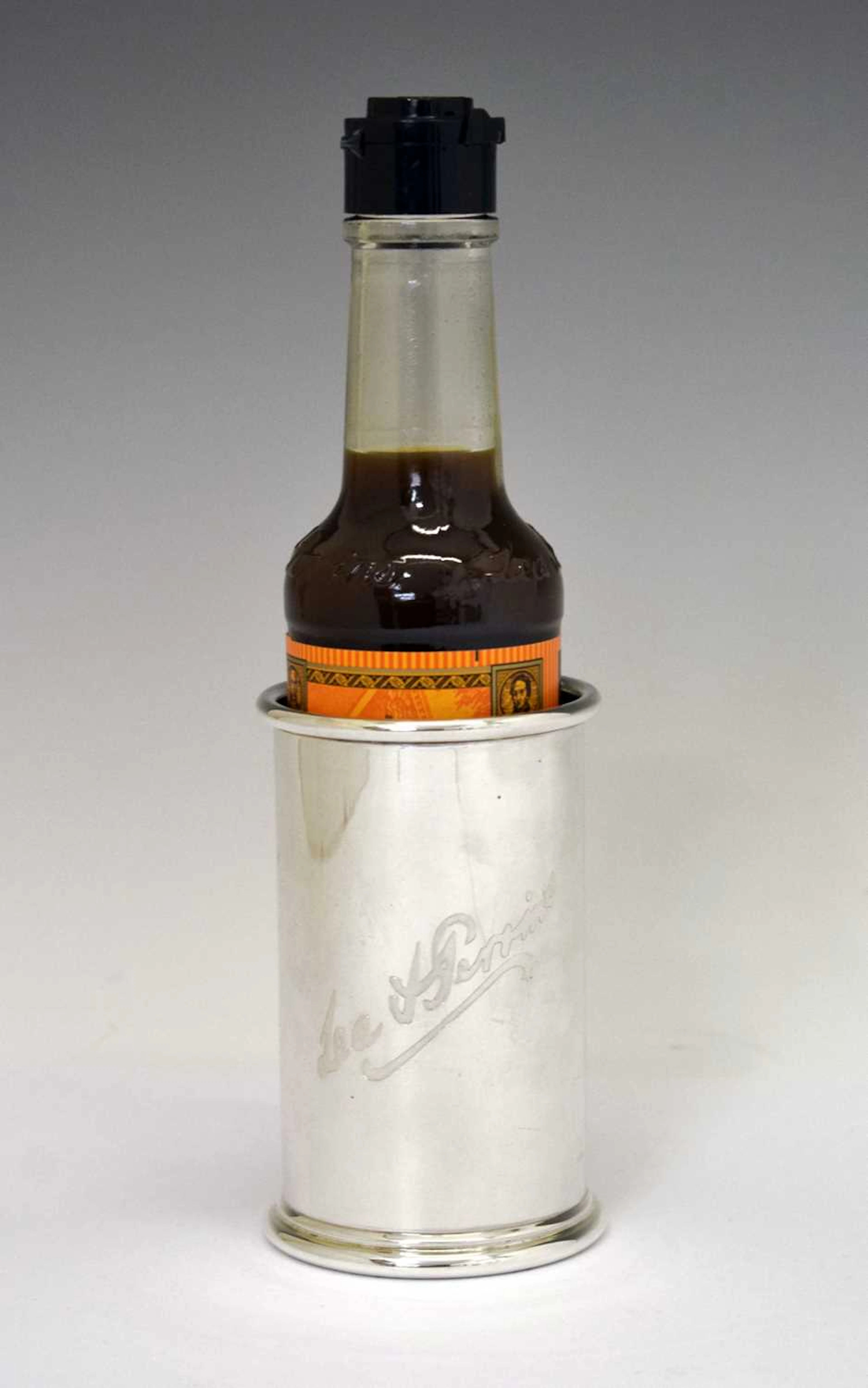 Theo Fennell - Elizabeth II silver 'Lea & Perrins' bottle holder or