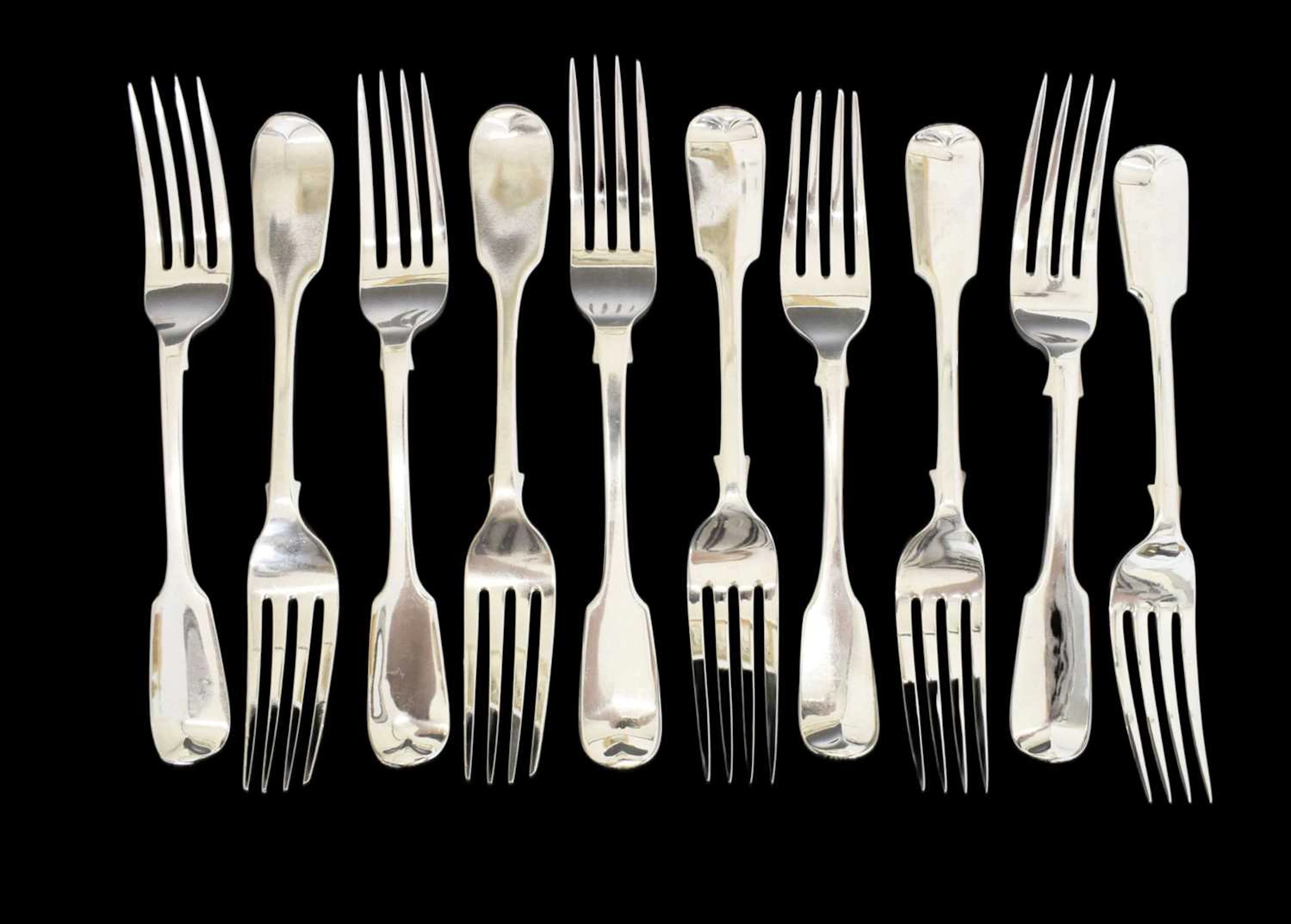 Matched set of ten silver Fiddle pattern table forks