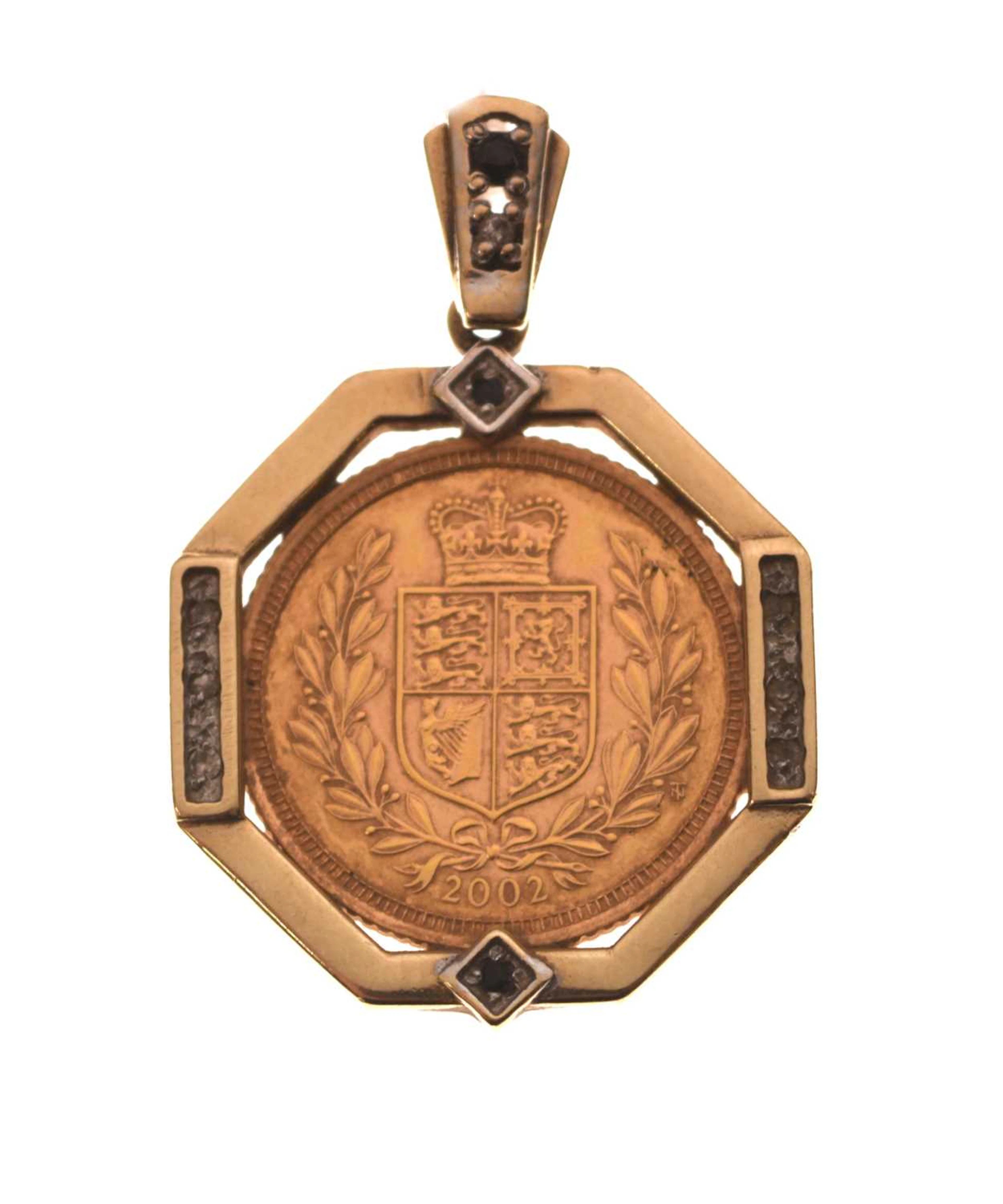 Elizabeth II gold half sovereign, 2002, in 9ct gold mount
