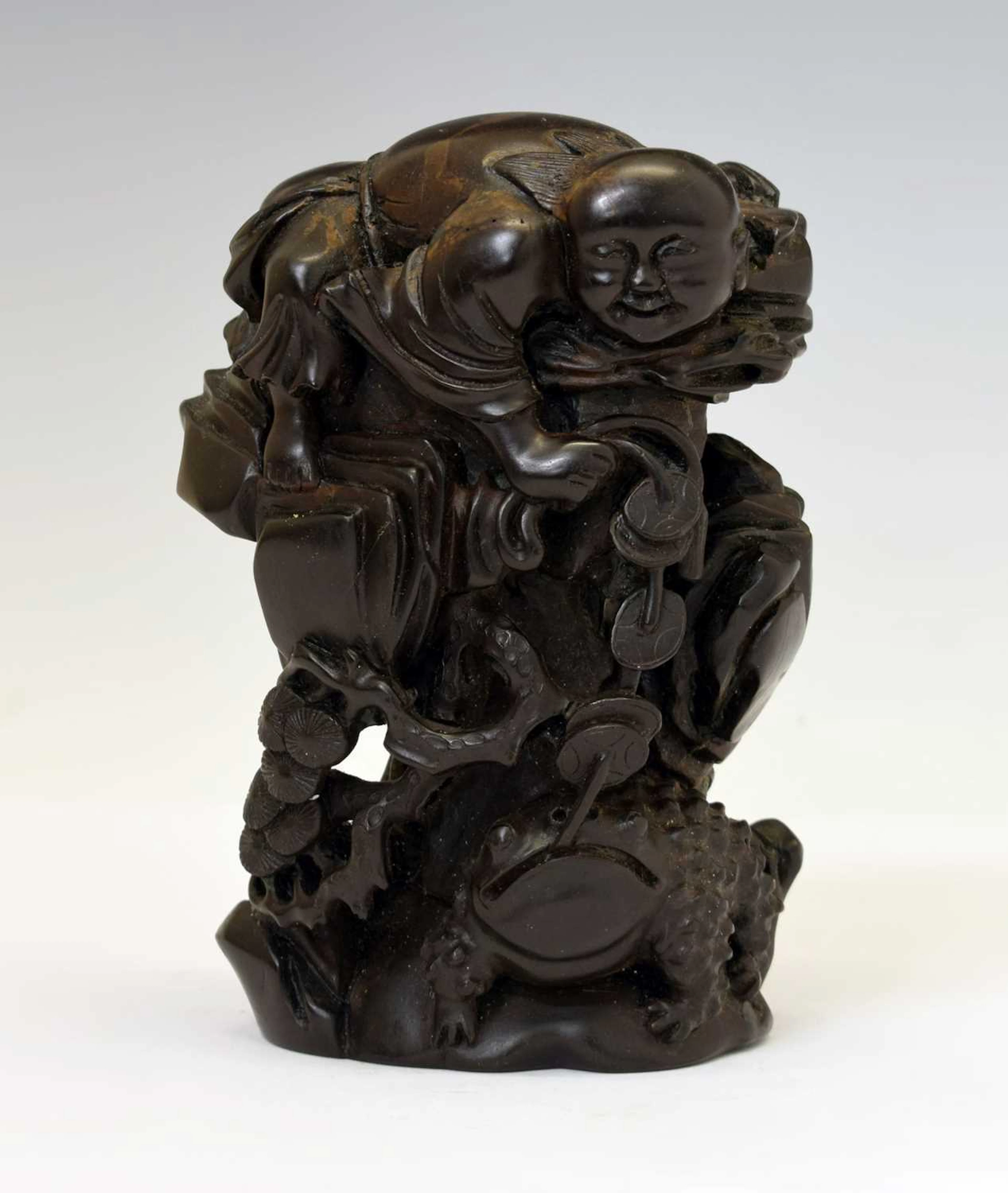 Chinese carved hardwood figure of Liu Haichan with a toad