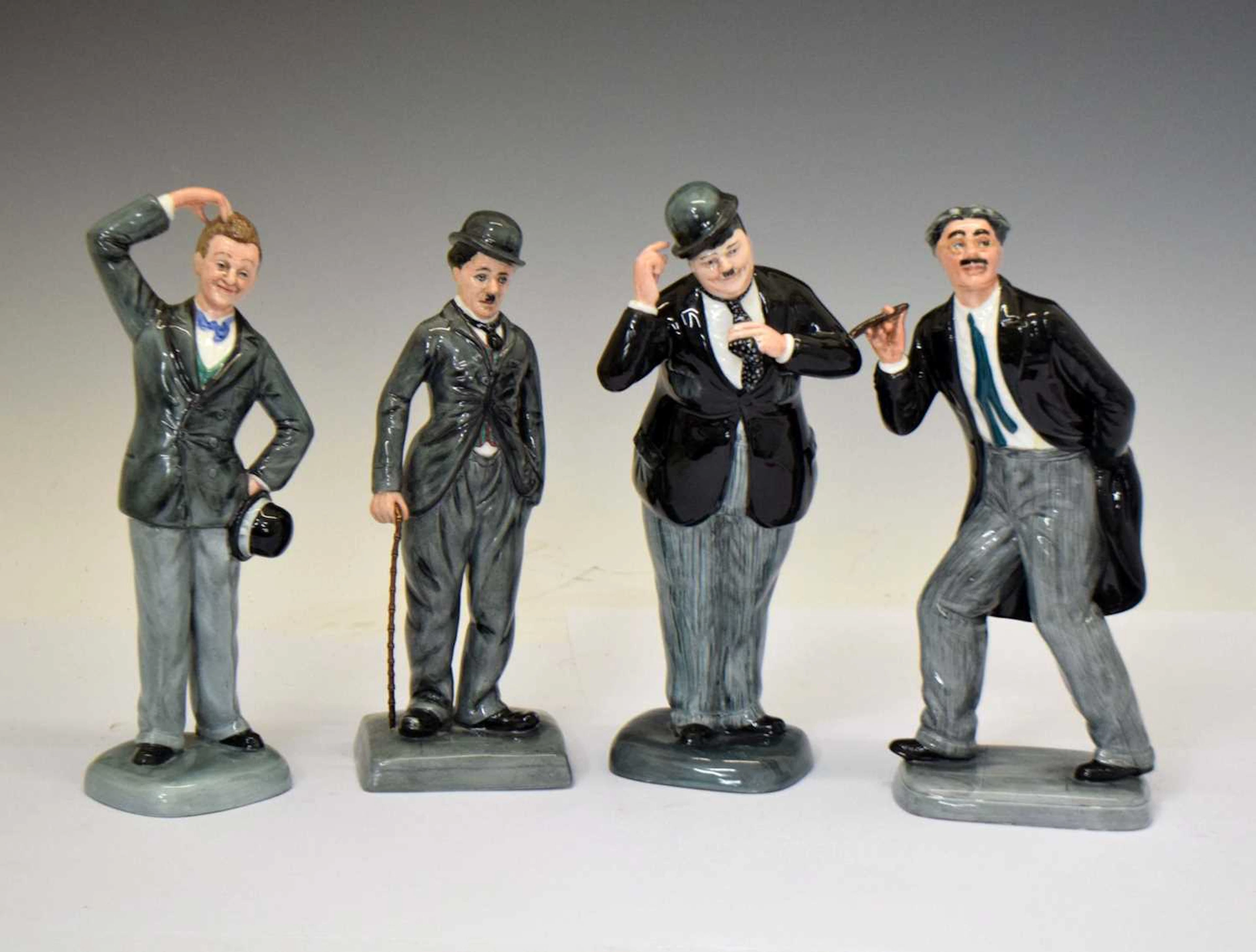 Four Royal Doulton limited edition figures