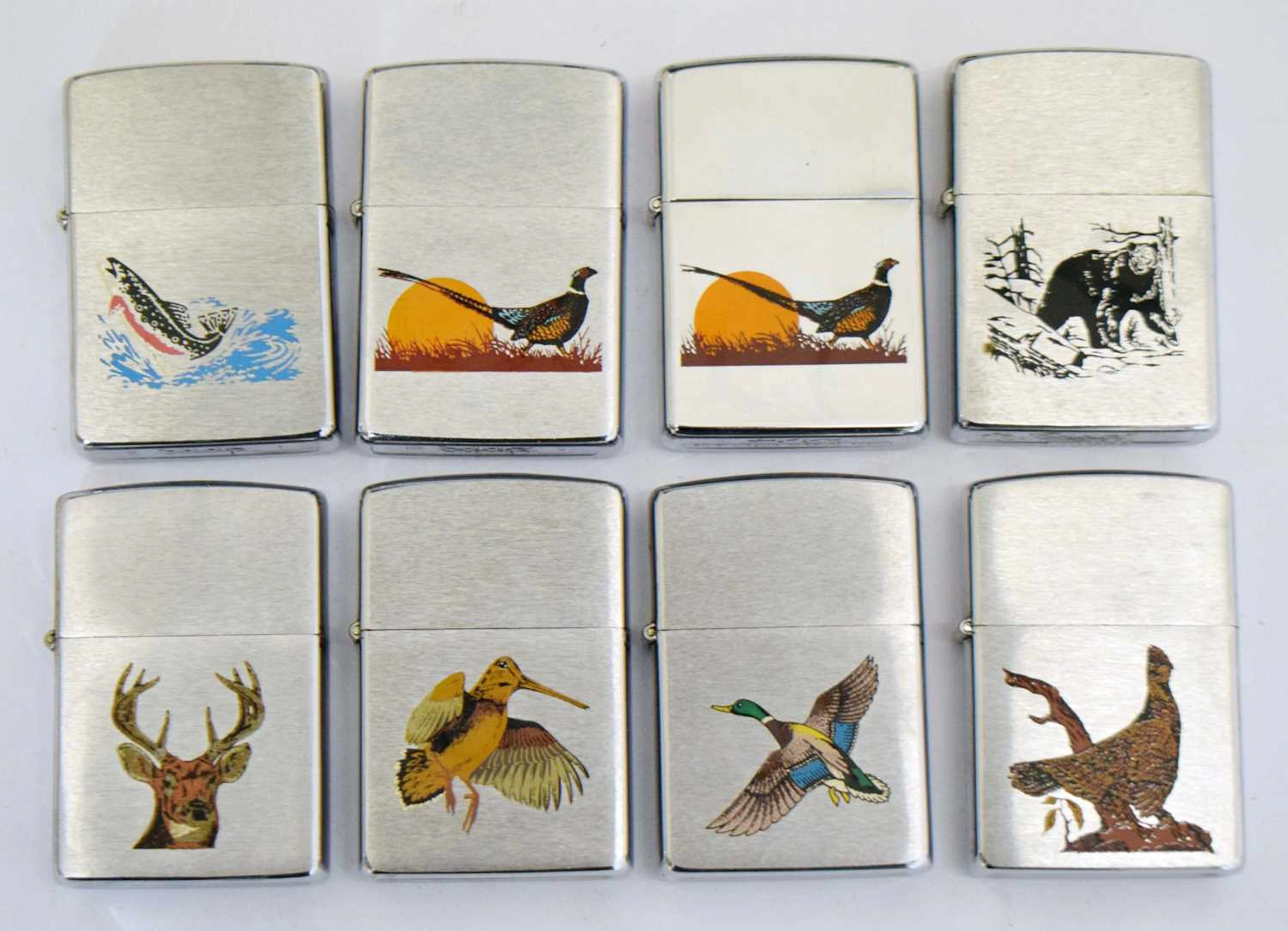 Collection of eight Zippo lighters