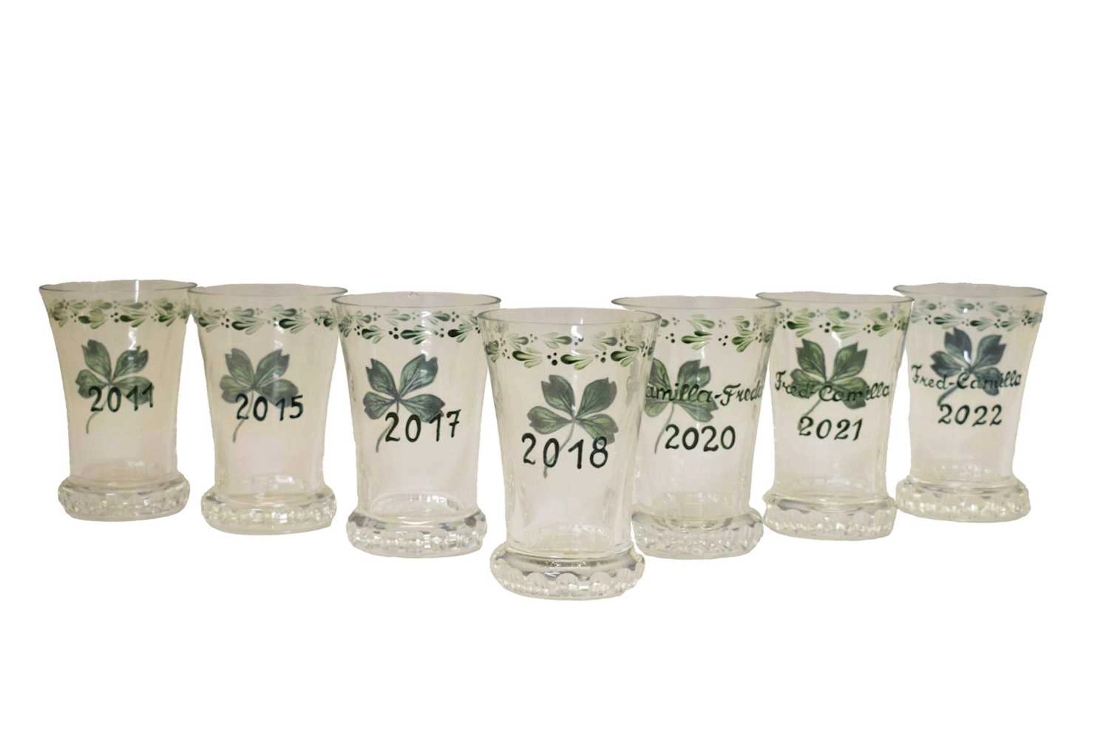 Maison Dior - Seven painted glass 'New Year' vases