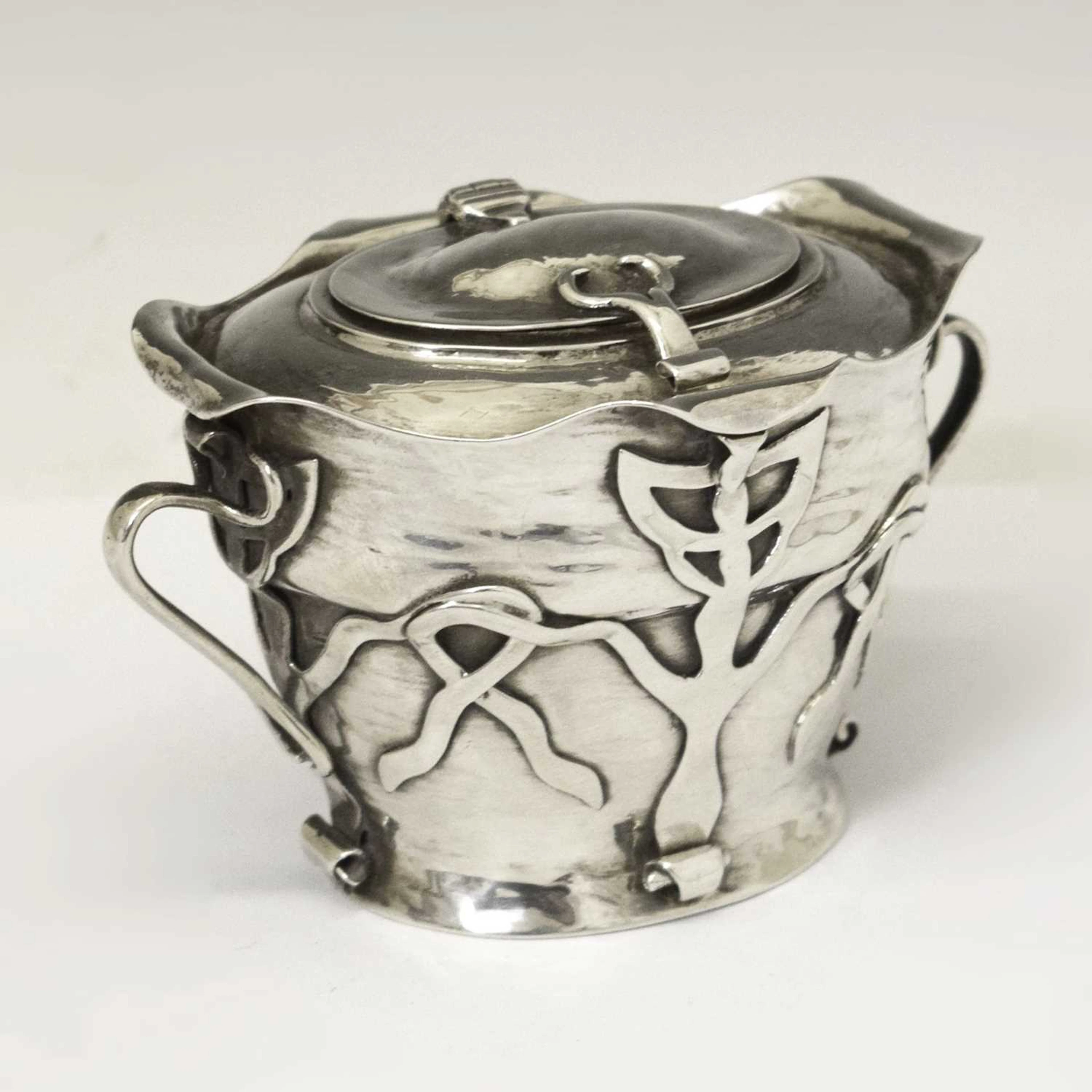 Edward VII silver tea caddy in the manner of Oliver Baker