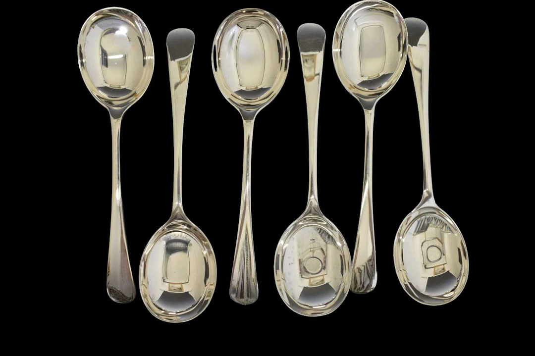 Set of six Old English pattern soup spoons