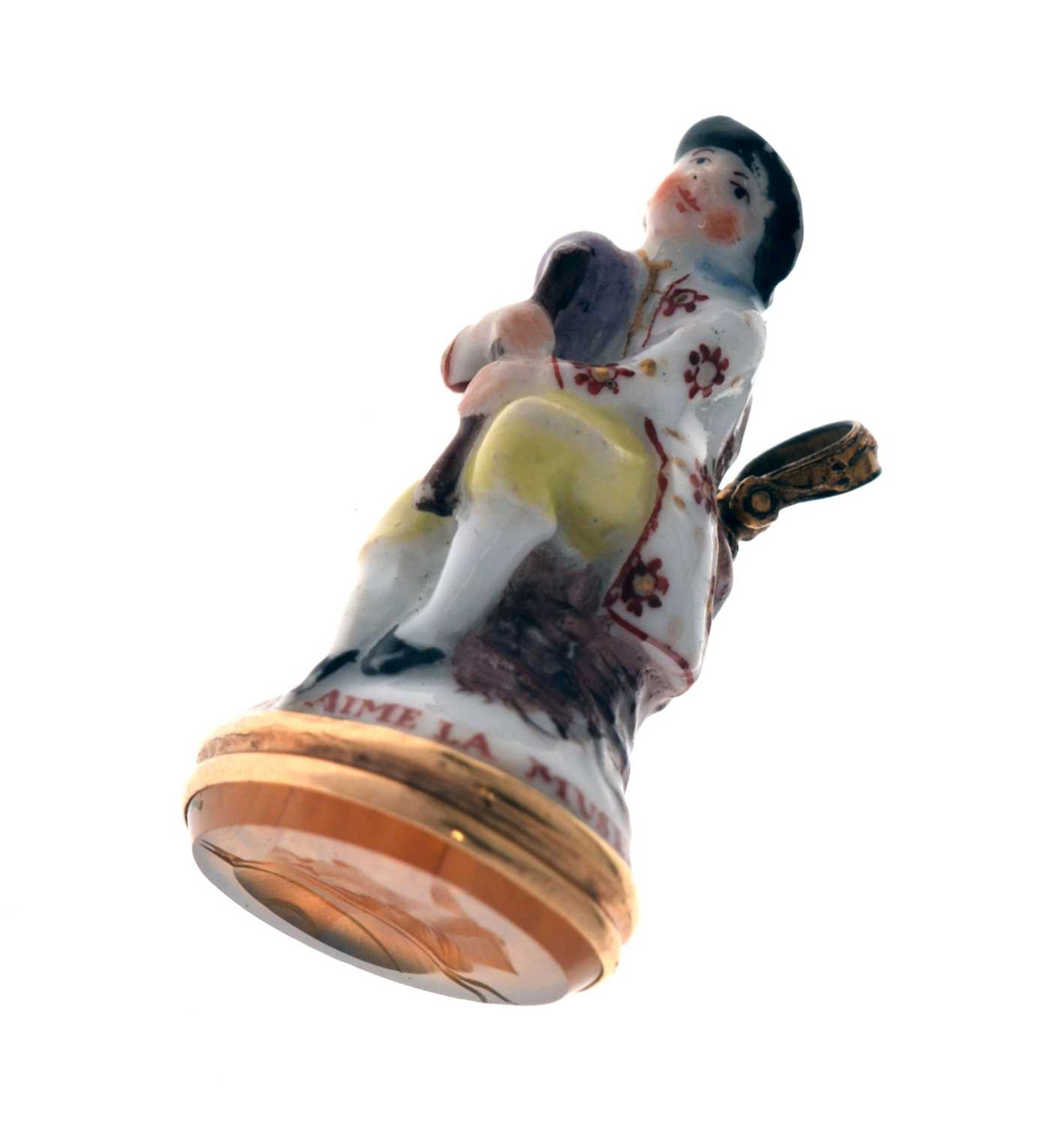 Chelsea porcelain figural seal, circa 1755, modelled as a seated gentleman