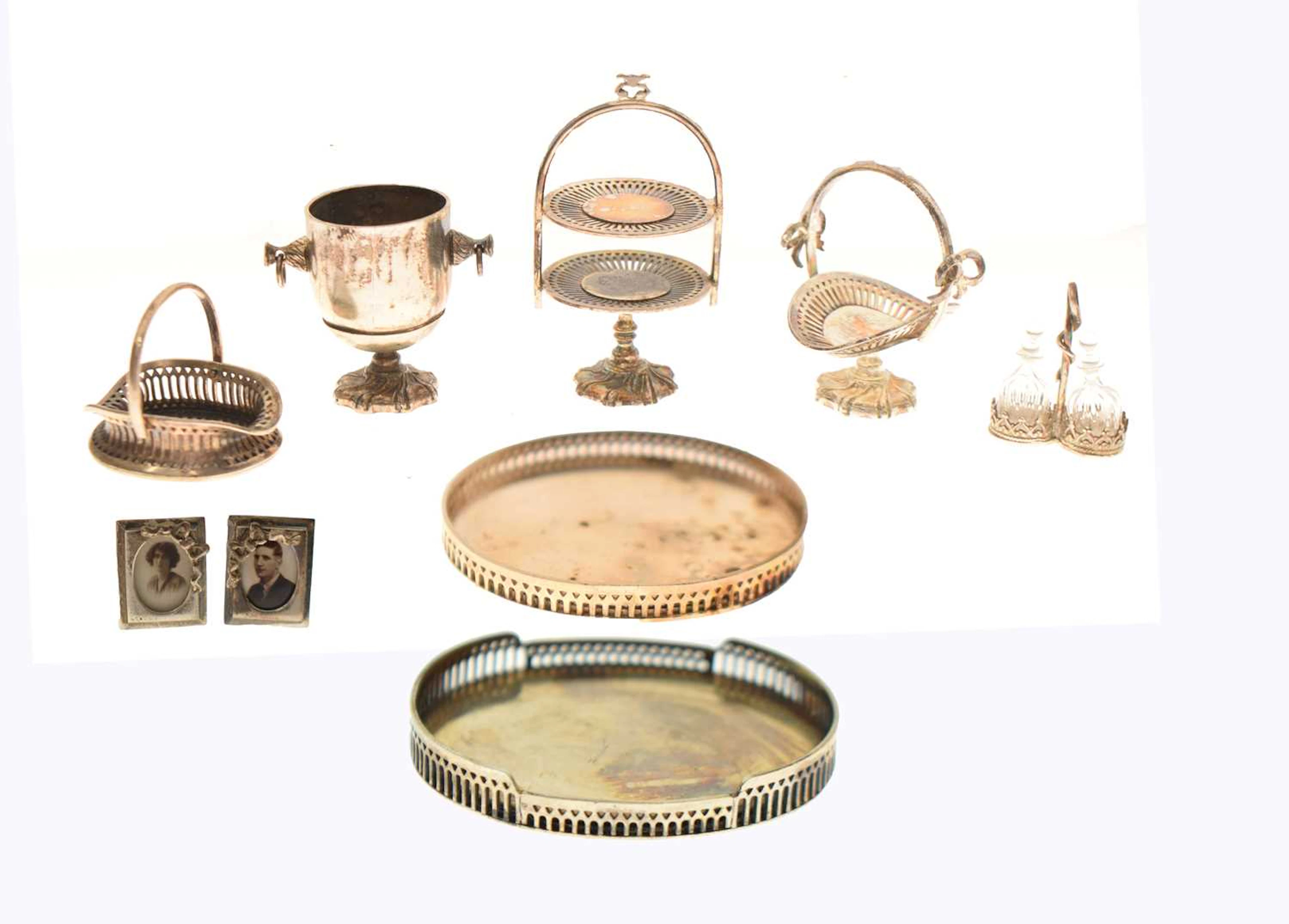 A small quantity of silver and white metal dolls house furniture