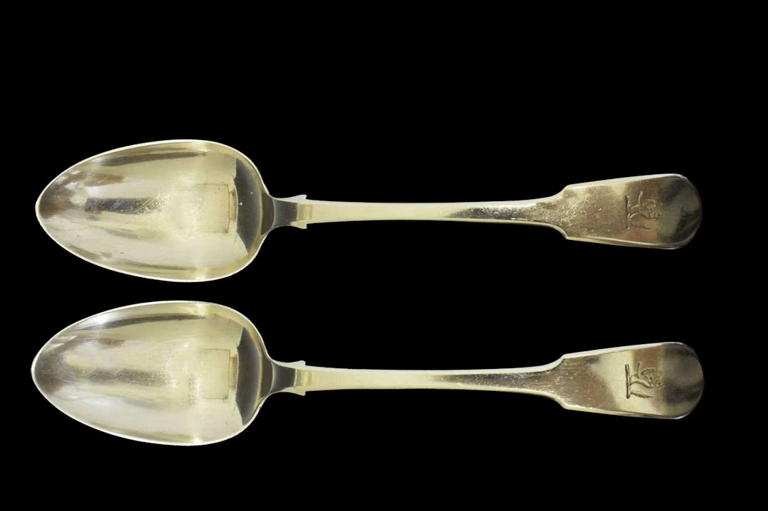 Pair of William IV silver Fiddle pattern table spoons