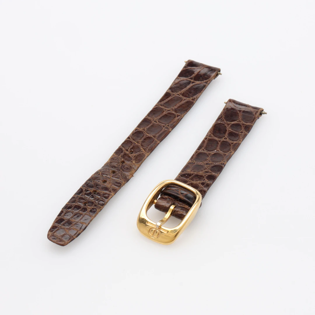 LÄDERARMBAND TILL DAMARMBANDSUR, SÖLJA AV FÖRGYLLD METALL, PIAGET.