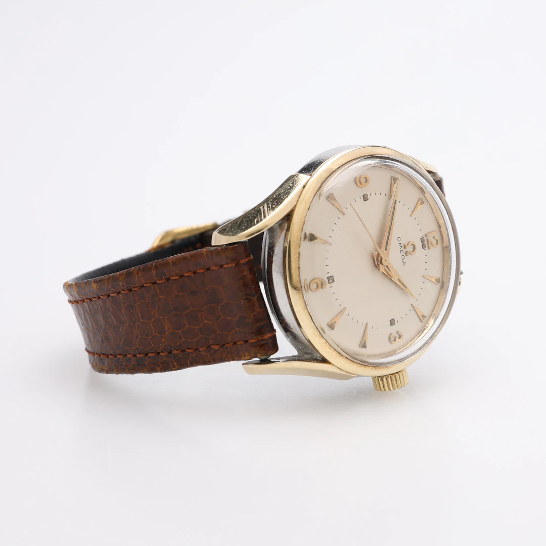 ARMBANDSUR, GULD PÅ STÅL, OMEGA, MANUELLT UPPDRAG, 1954.