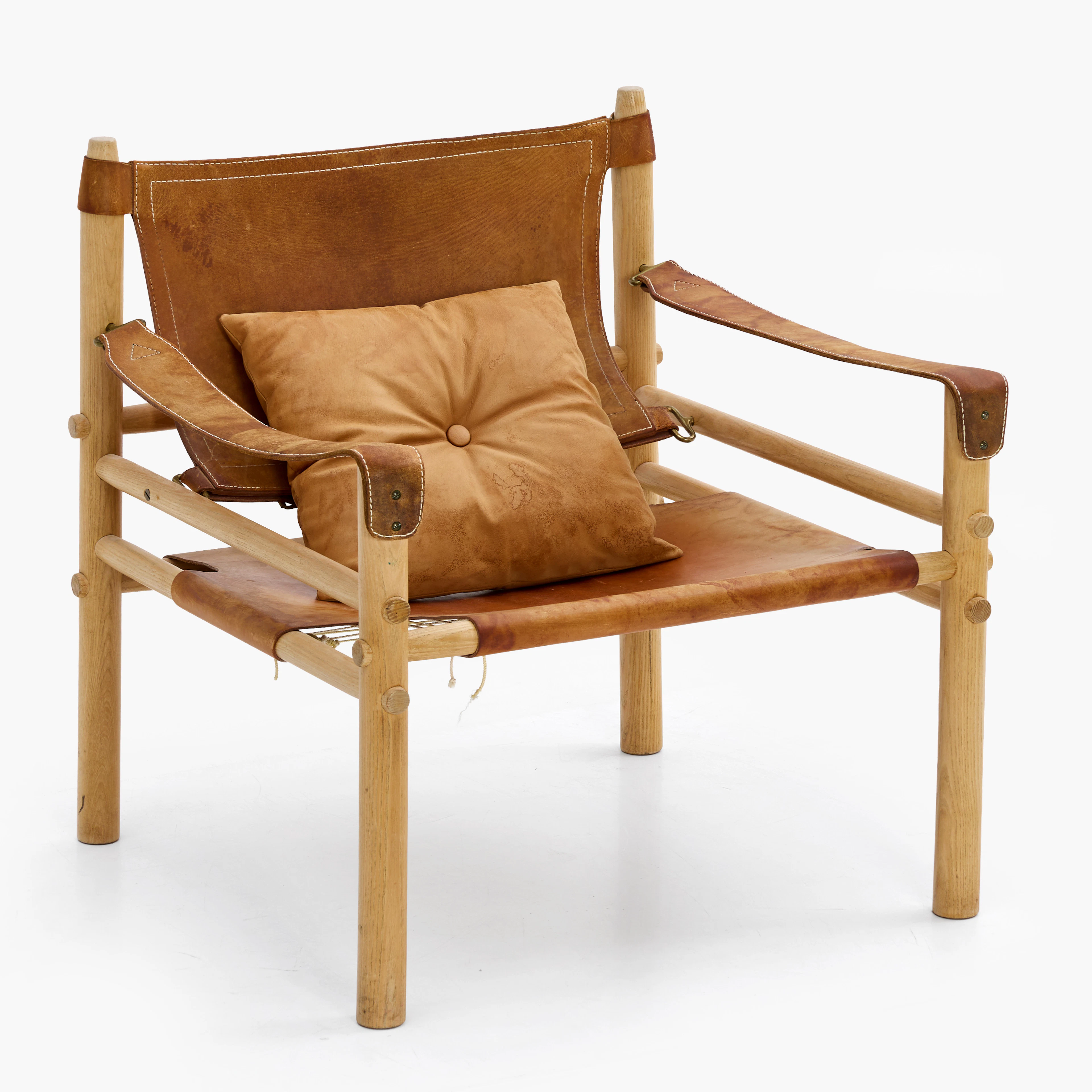 ARNE NORELL (SVERIGE, 1917–1971). Fåtölj "Sirocco", ek, brunt läder