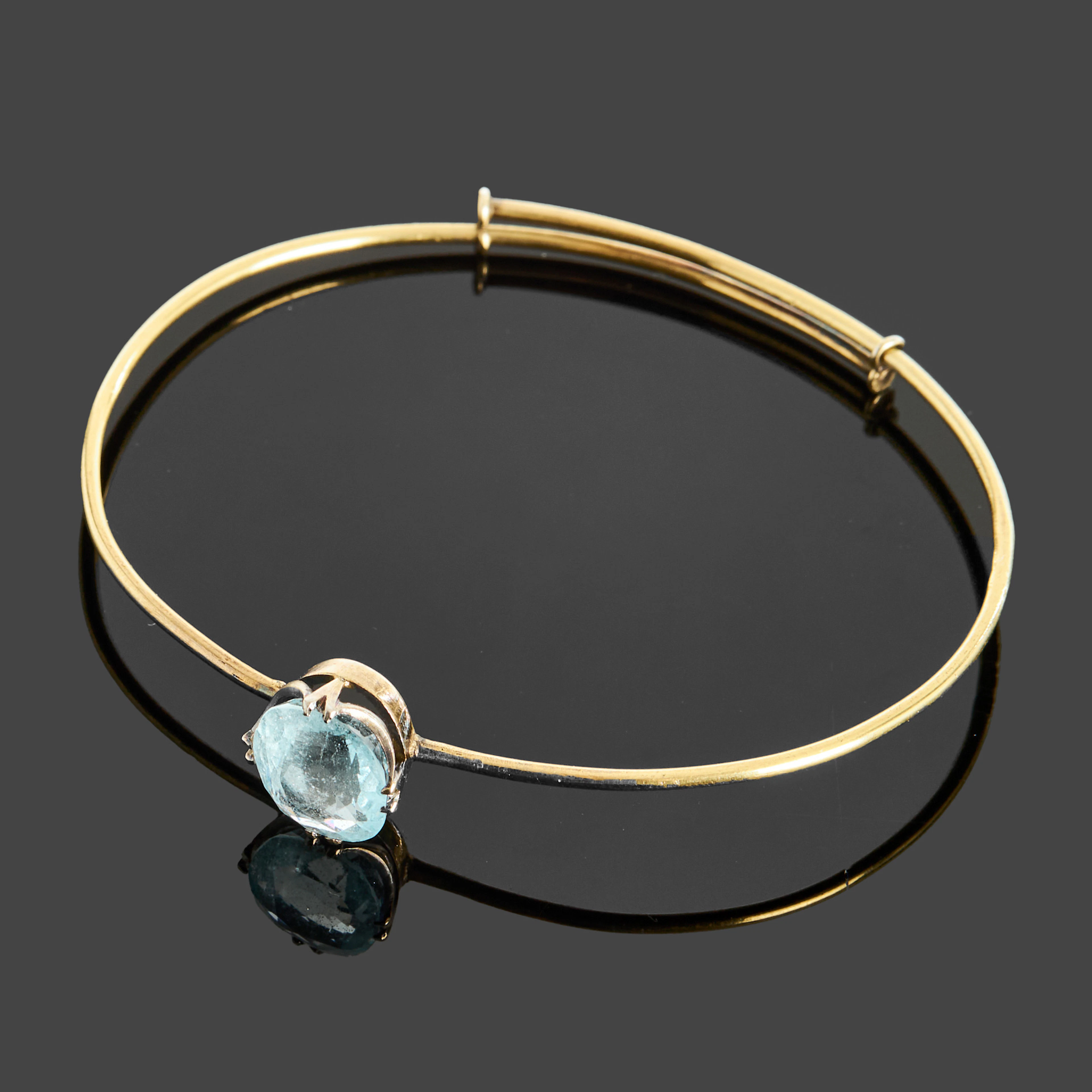 ARMRING, 14k guld med en akvamarin ca 4.81ct.