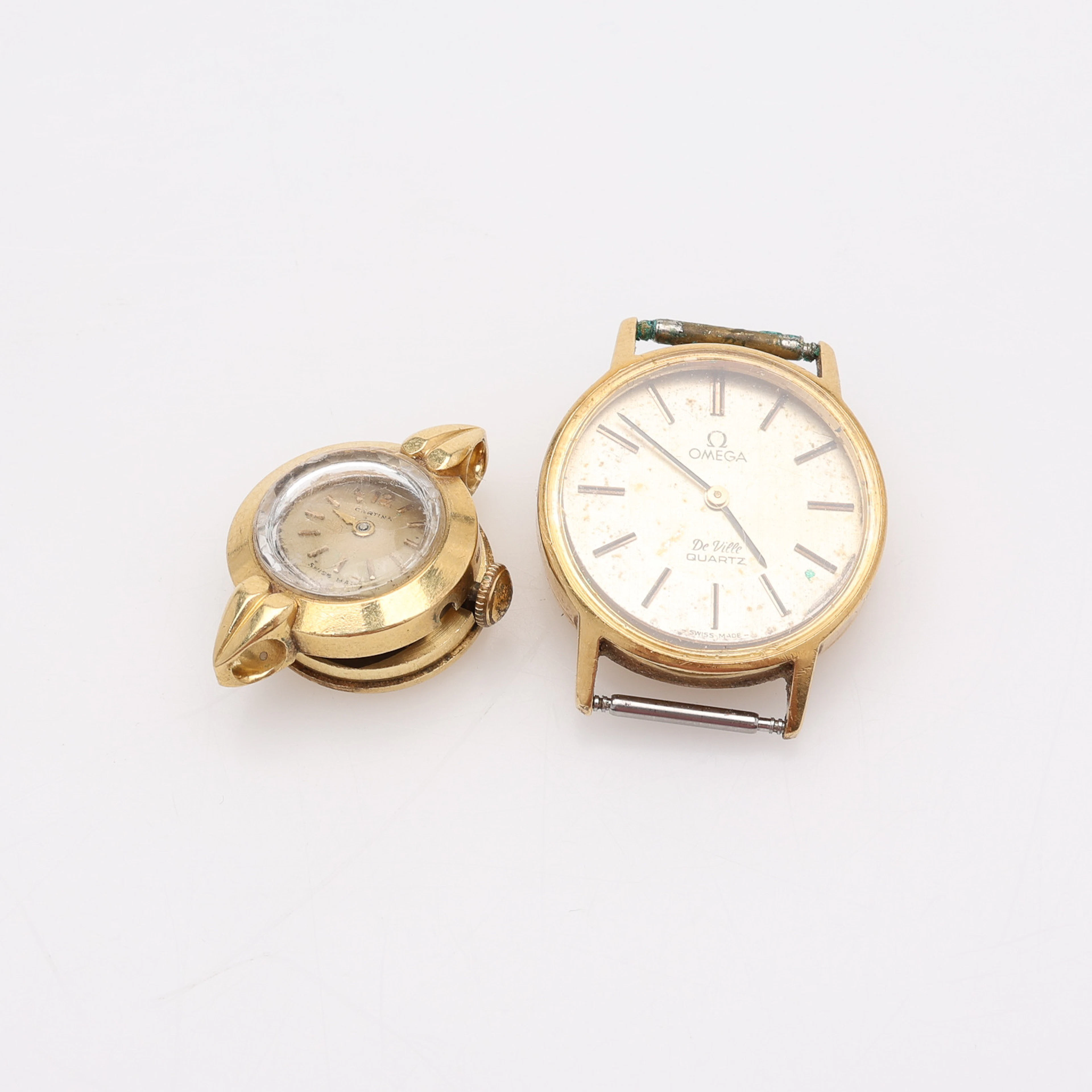 KLOCKOR, CERTINA OCH OMEGA, TVÅ STYCKEN, 18K GULD.
