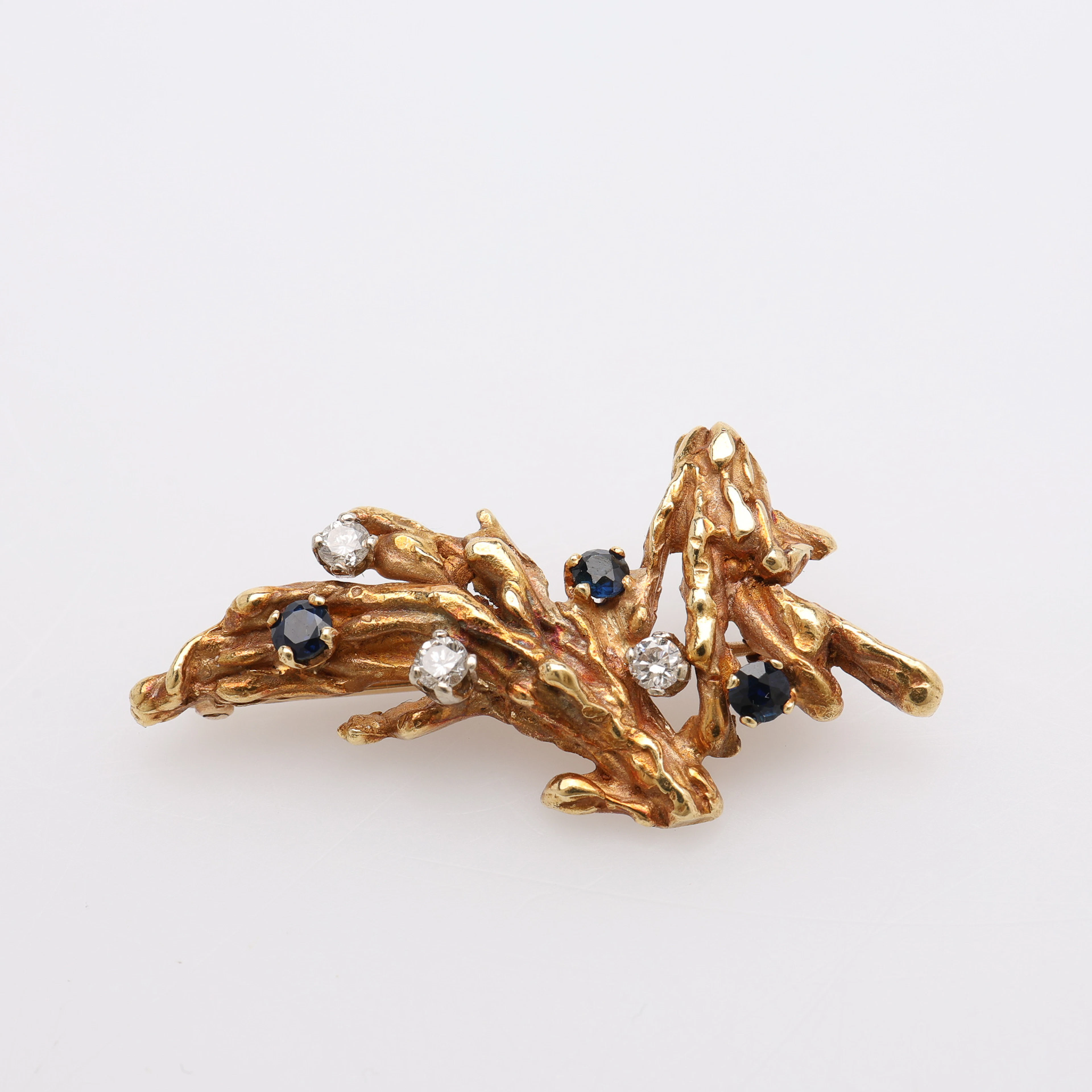 BROSCH, 18K GULD, BRILJANTER & TOPASER, TOTALT 7,9 GRAM.