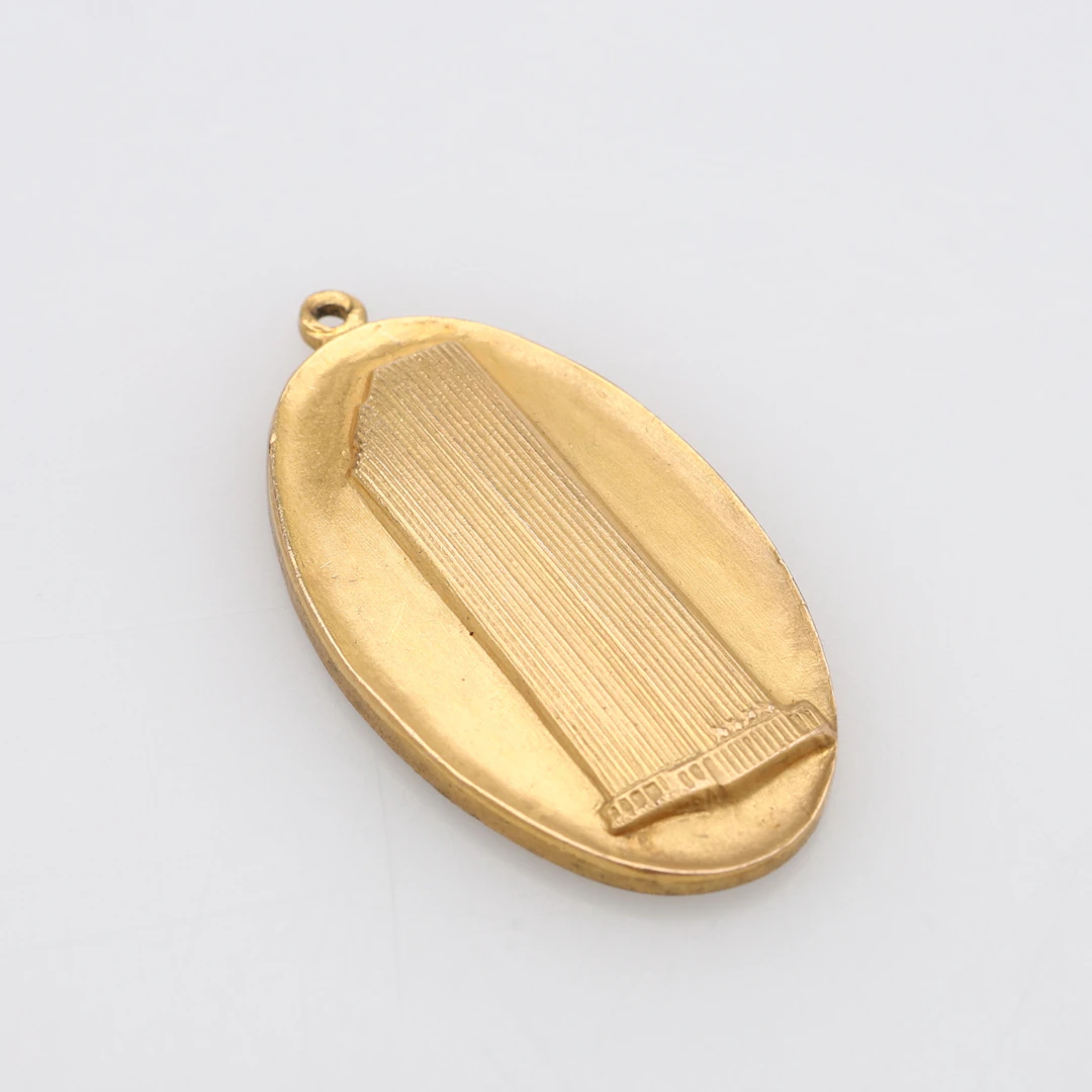 MEDALJONG, GENERAL MOTORS, 10K GULD, USA, VIKT 5,9 GRAM.