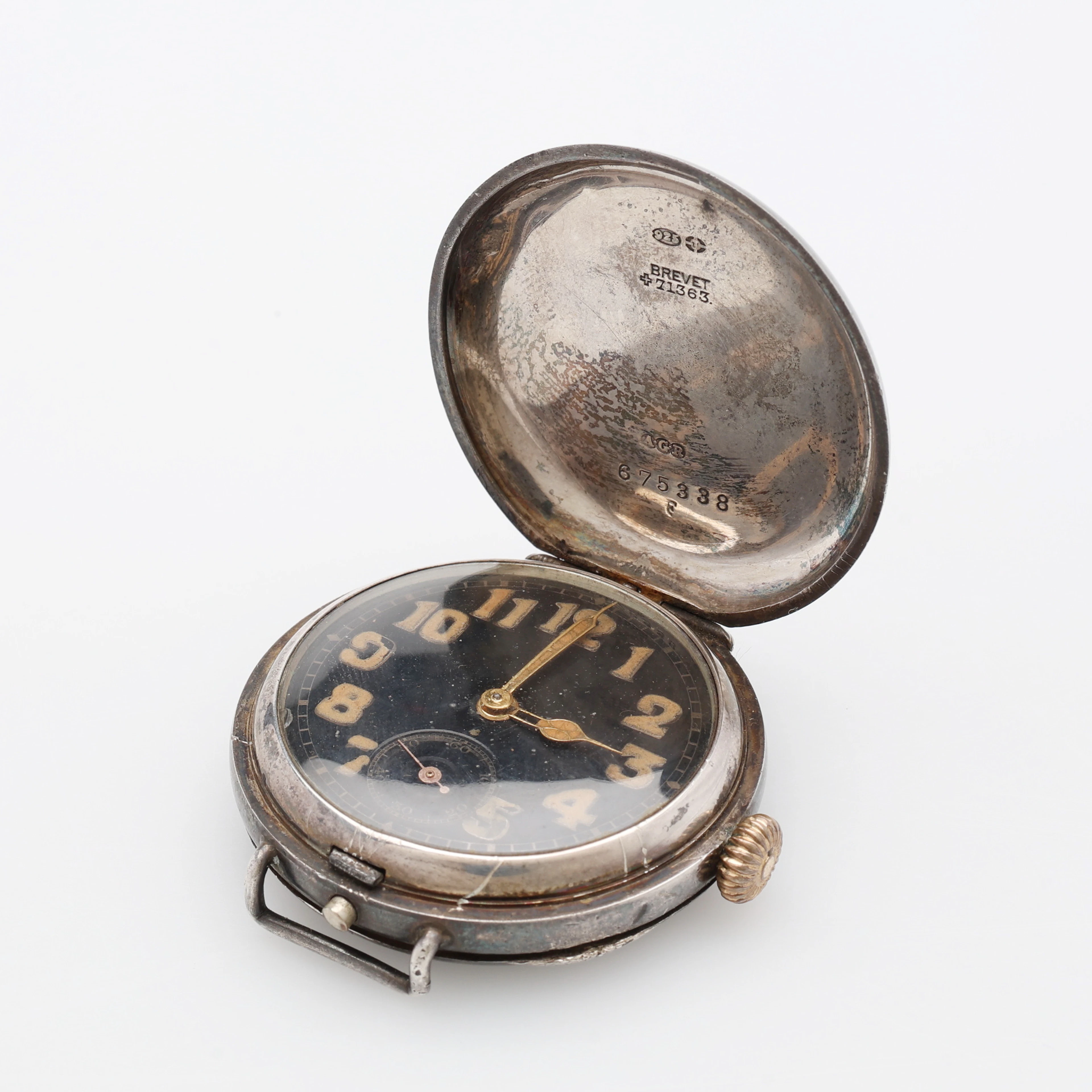ARMBANDSUR, STÅL, S.K. TRENCH WATCH, MANUELLT UPPDRAG, SILVERBOETTEN