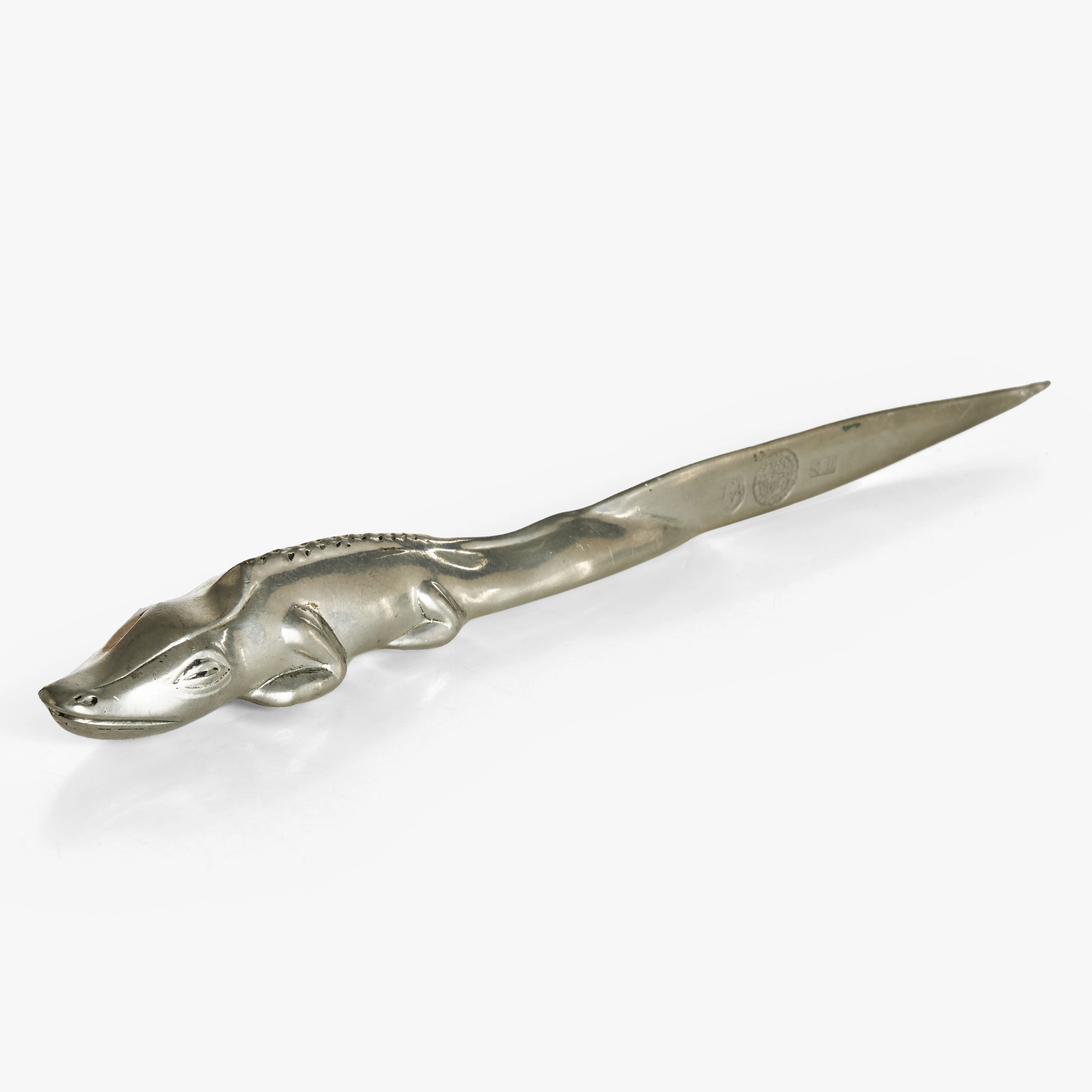 BJÖRN TRÄGÅRDH (1908–1998). Brevkniv, i form av krokodil, tenn, Firma