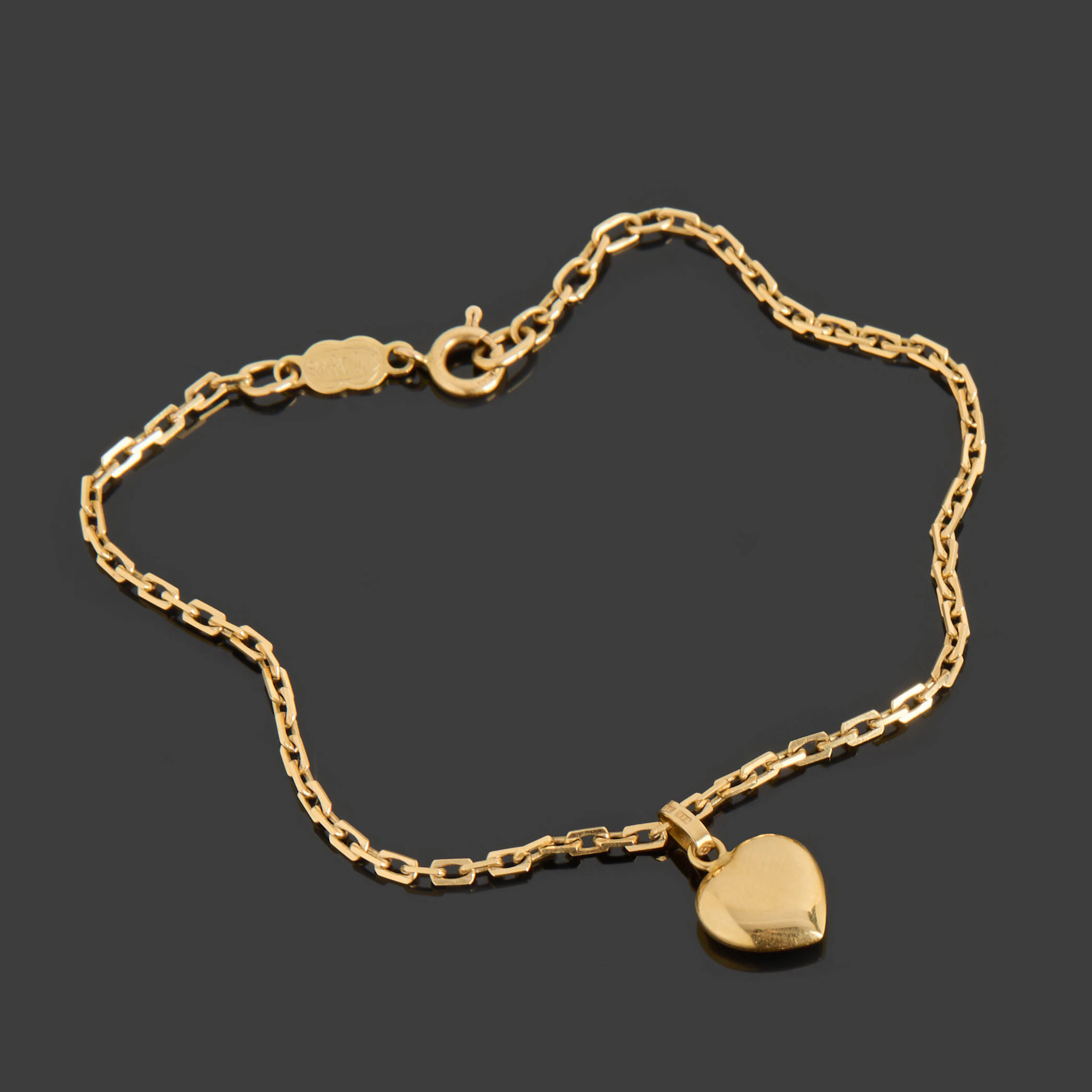 ARMBAND, 18k guld, ankar-länk med ett hänge i form av ett hjärta.