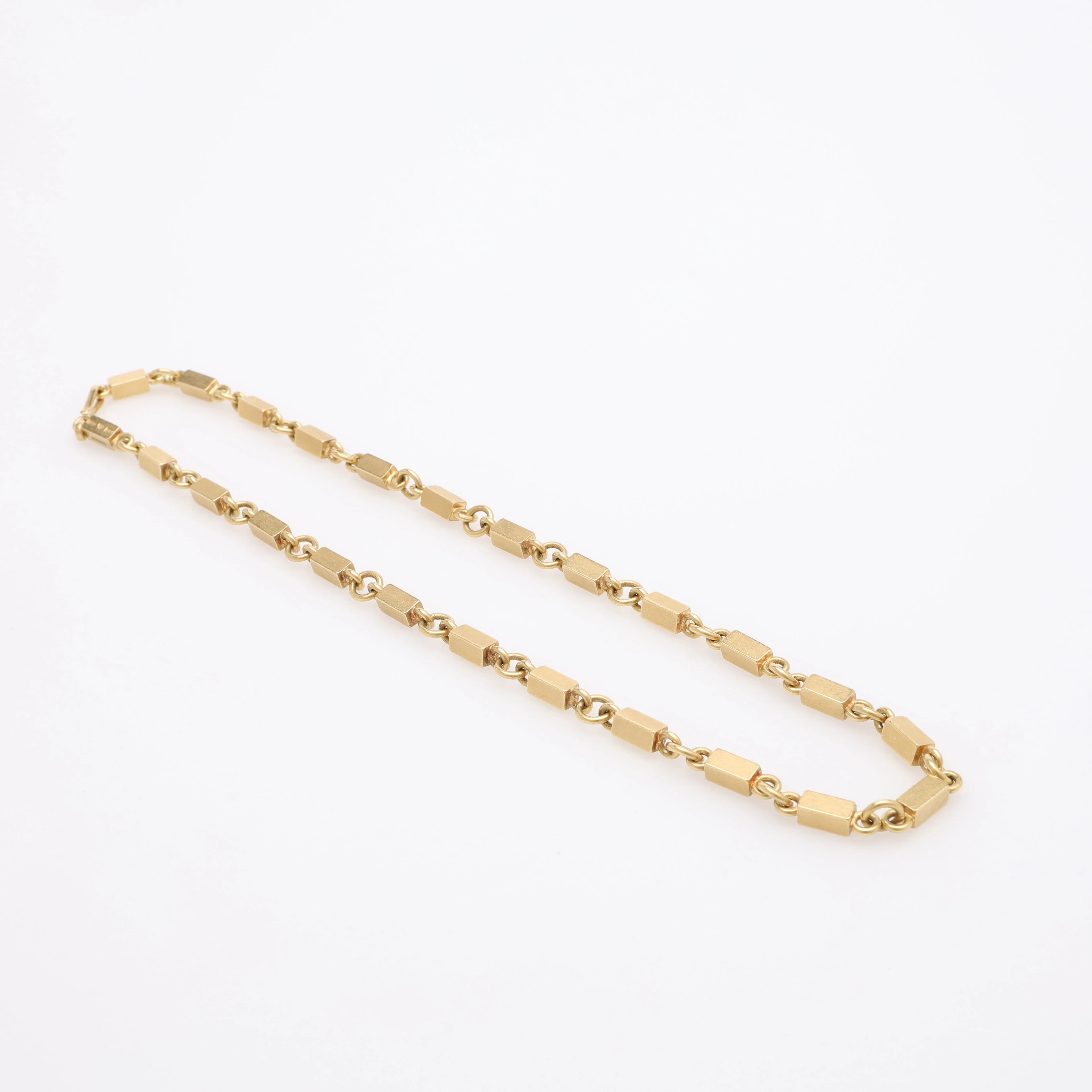WIWEN NILSSON. COLLIER, 18K GULD, RING- & STAVLÄNK, STÄMPELSIGNERAD