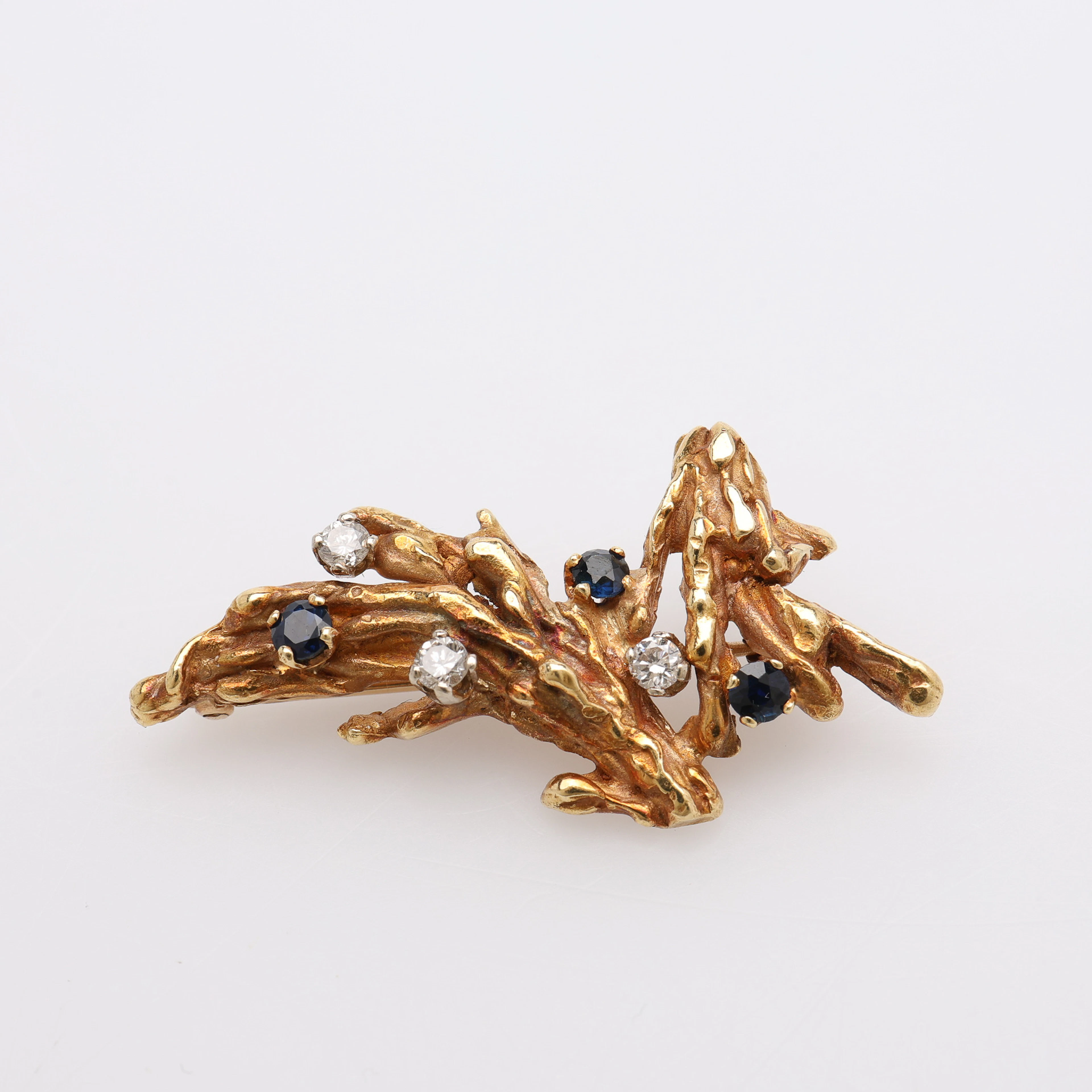 BROSCH, 18K GULD, BRILJANTER & TOPASER, TOTALT 7,9 GRAM.