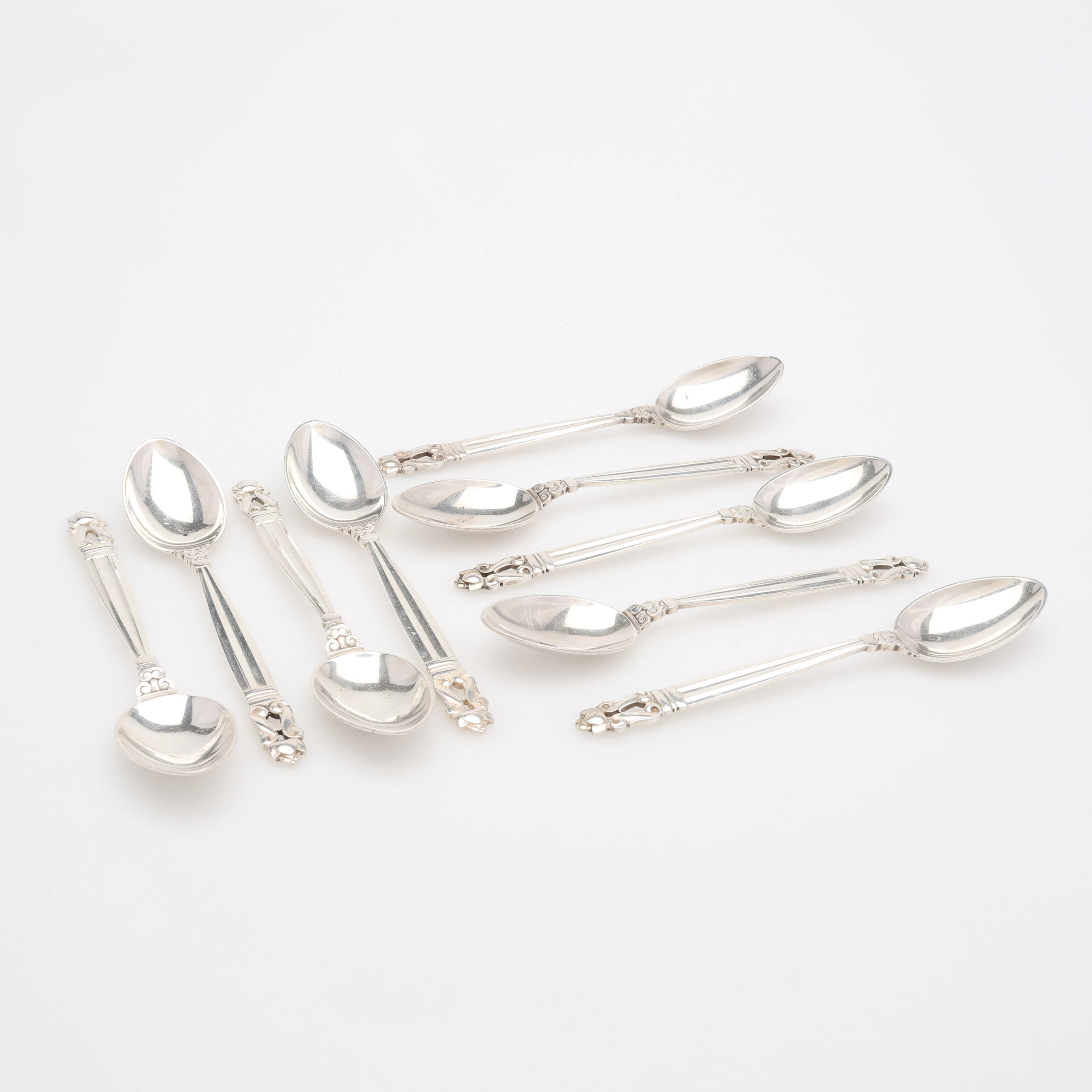 JOHAN ROHDE. TESKEDAR, NIO STYCKEN, "KONGE/ACORN", FÖR GEORG JENSEN, DANMARK.