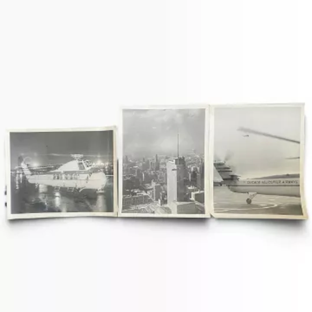 A group of three photographic prints, black and white, 'Chicago Helicopter