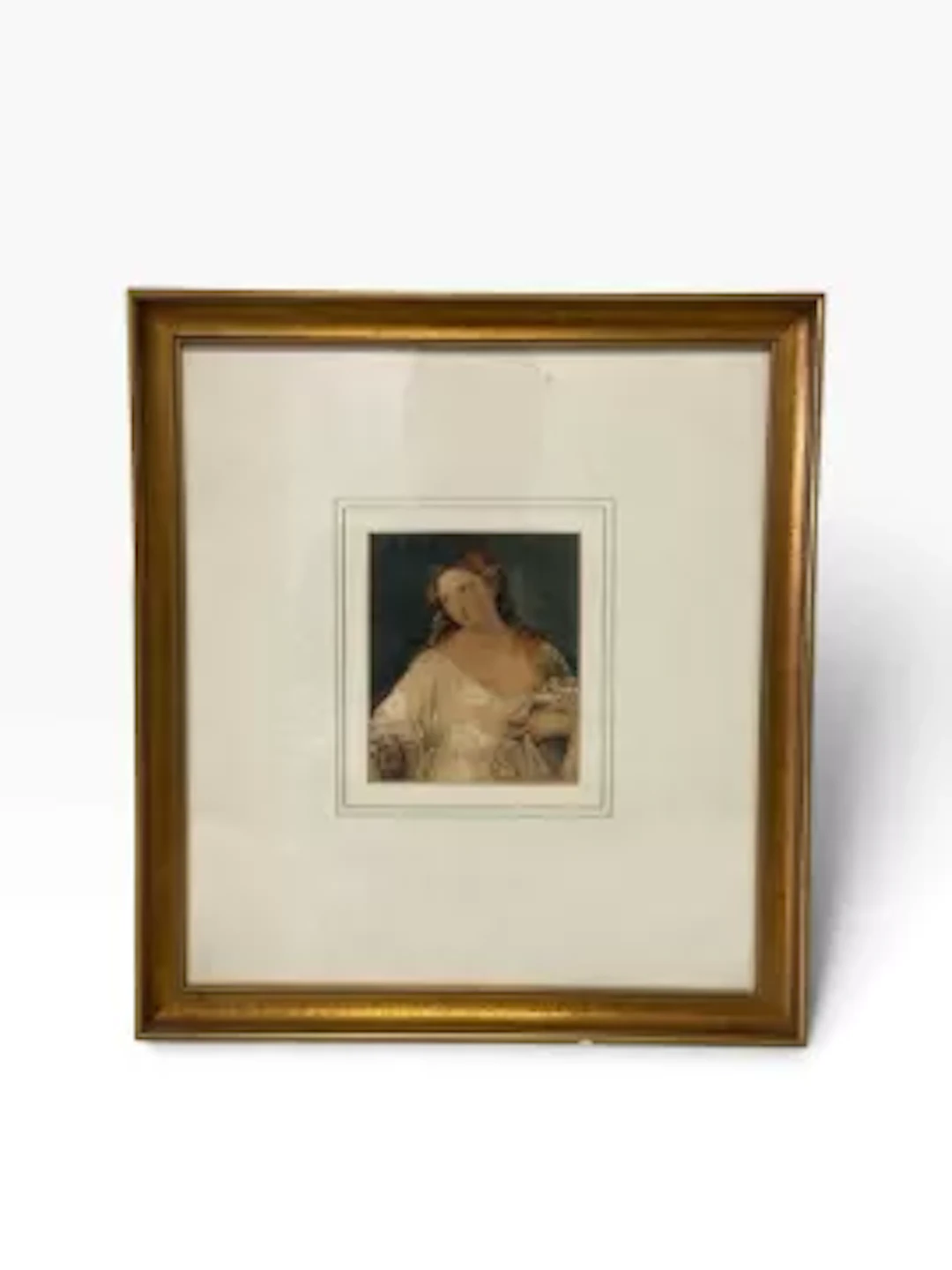 A contemporary print after Titian's Flora. Framed and glazed. H33cm x W.30cm