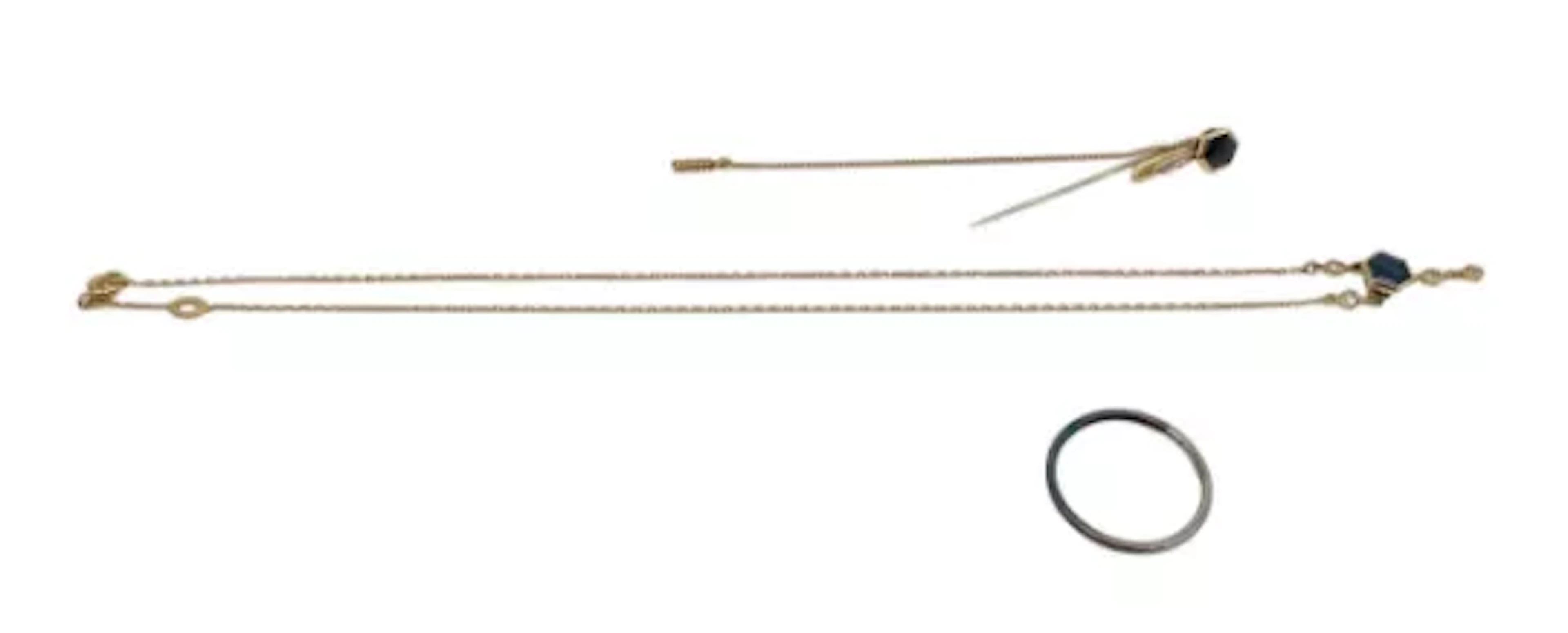 A vintage 18k gold and diamond stick pin and necklace set together